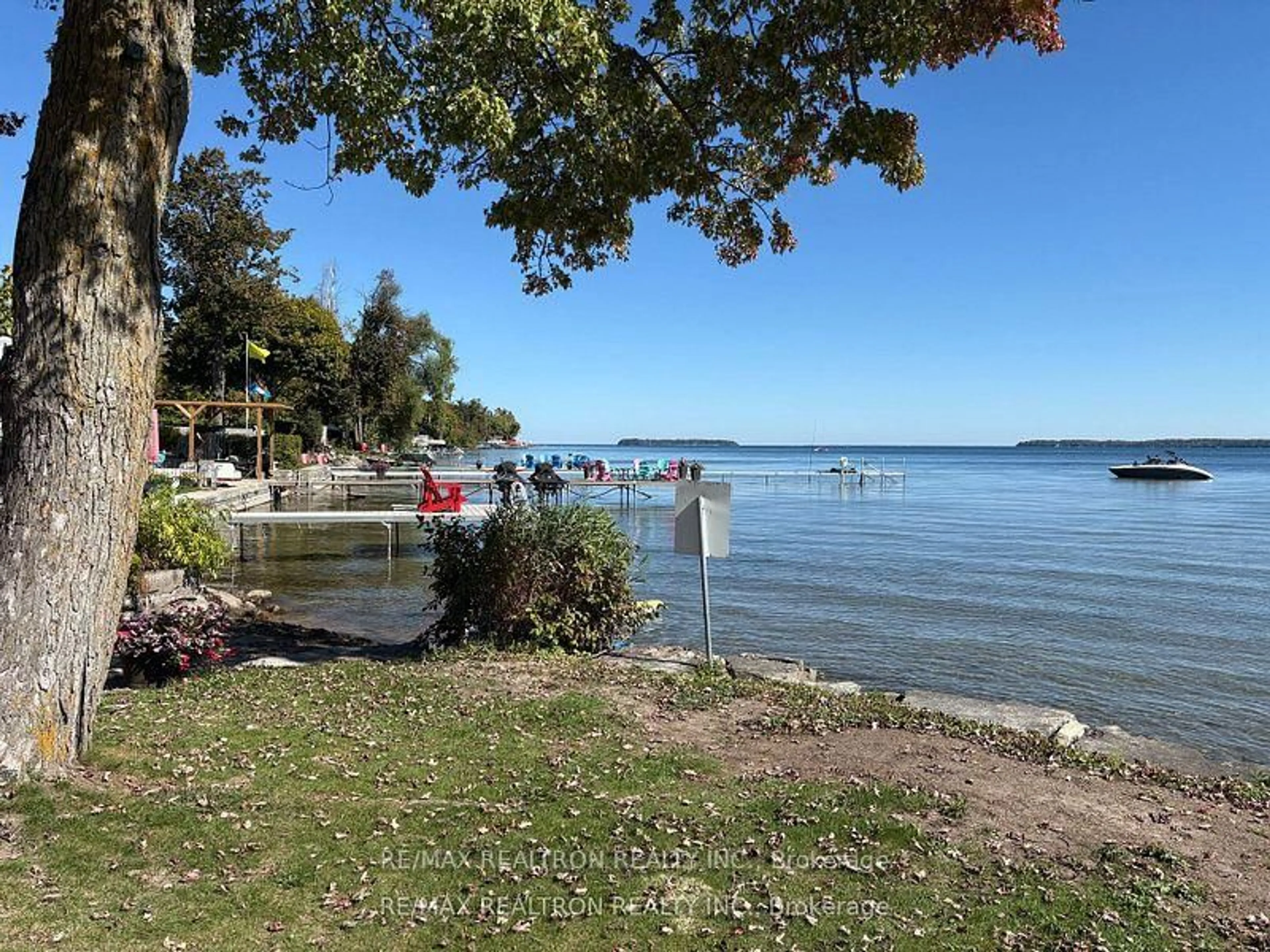 A pic from outside/outdoor area/front of a property/back of a property/a pic from drone, water/lake/river/ocean view for 911 Vicrol Dr, Innisfil Ontario L9S 1V4