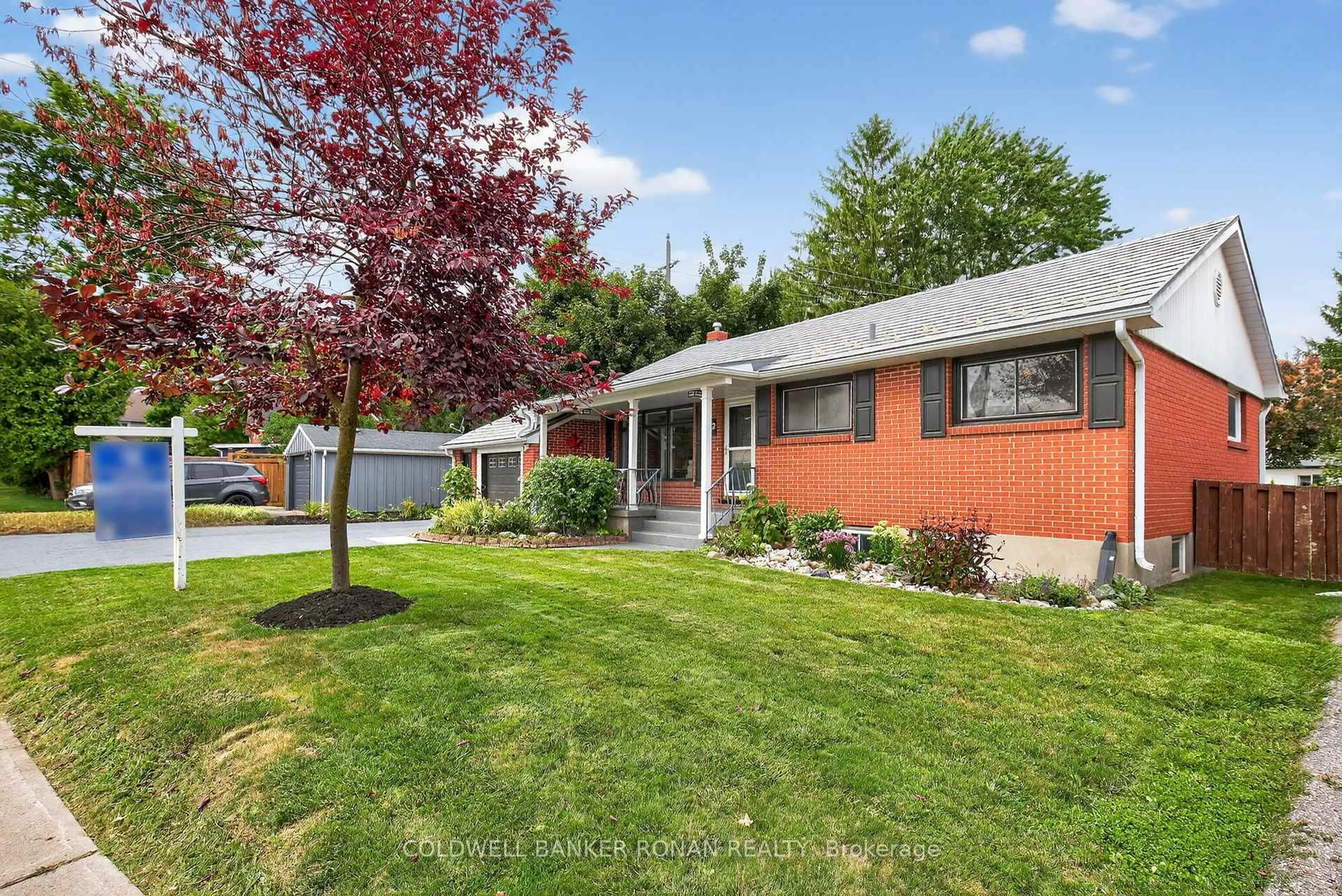 Home with vinyl exterior material, street for 2 Lionel Stone Ave, New Tecumseth Ontario L0G 1W0