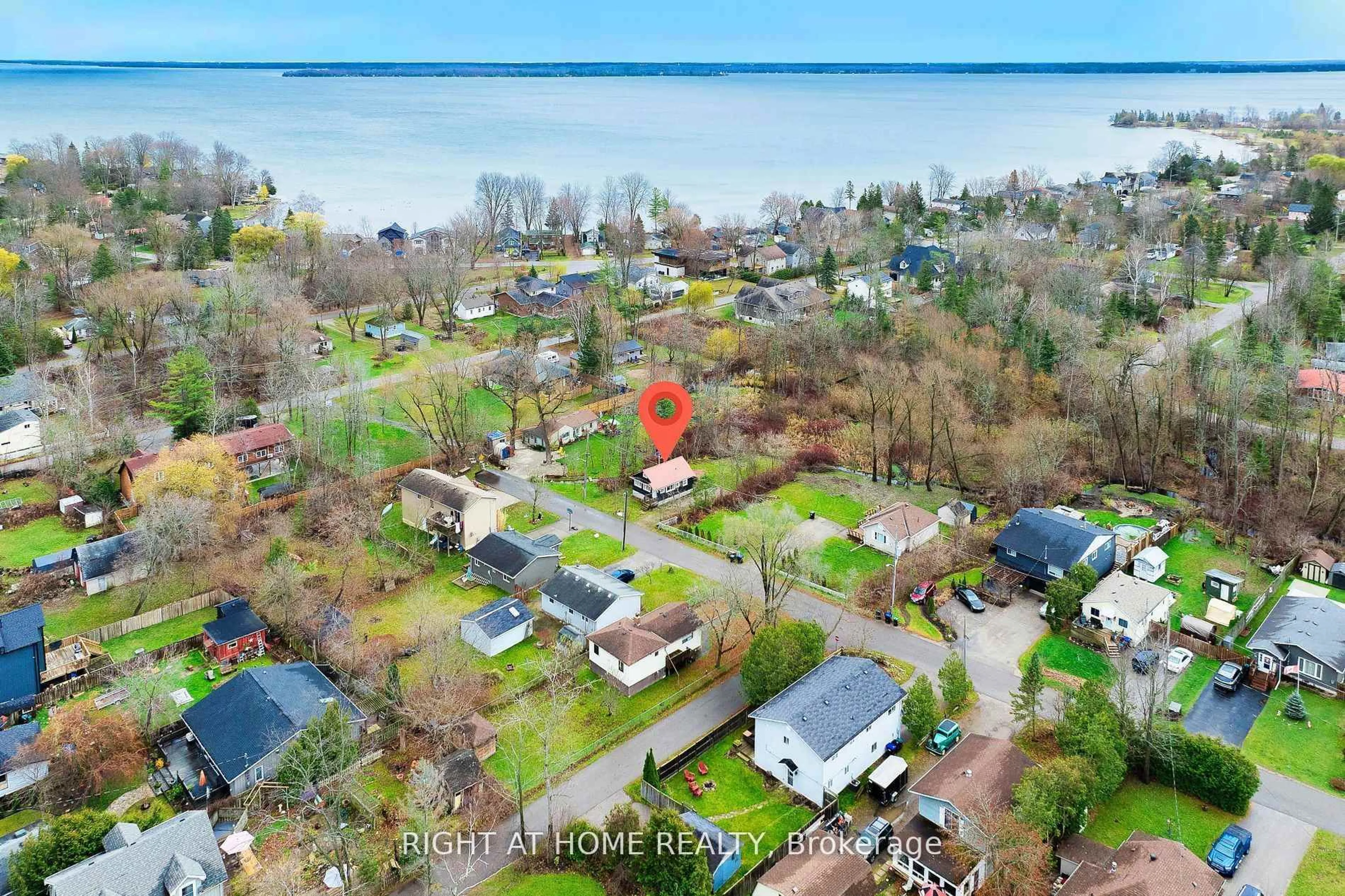 A pic from outside/outdoor area/front of a property/back of a property/a pic from drone, water/lake/river/ocean view for 685 Reid St, Innisfil Ontario L9S 2E9