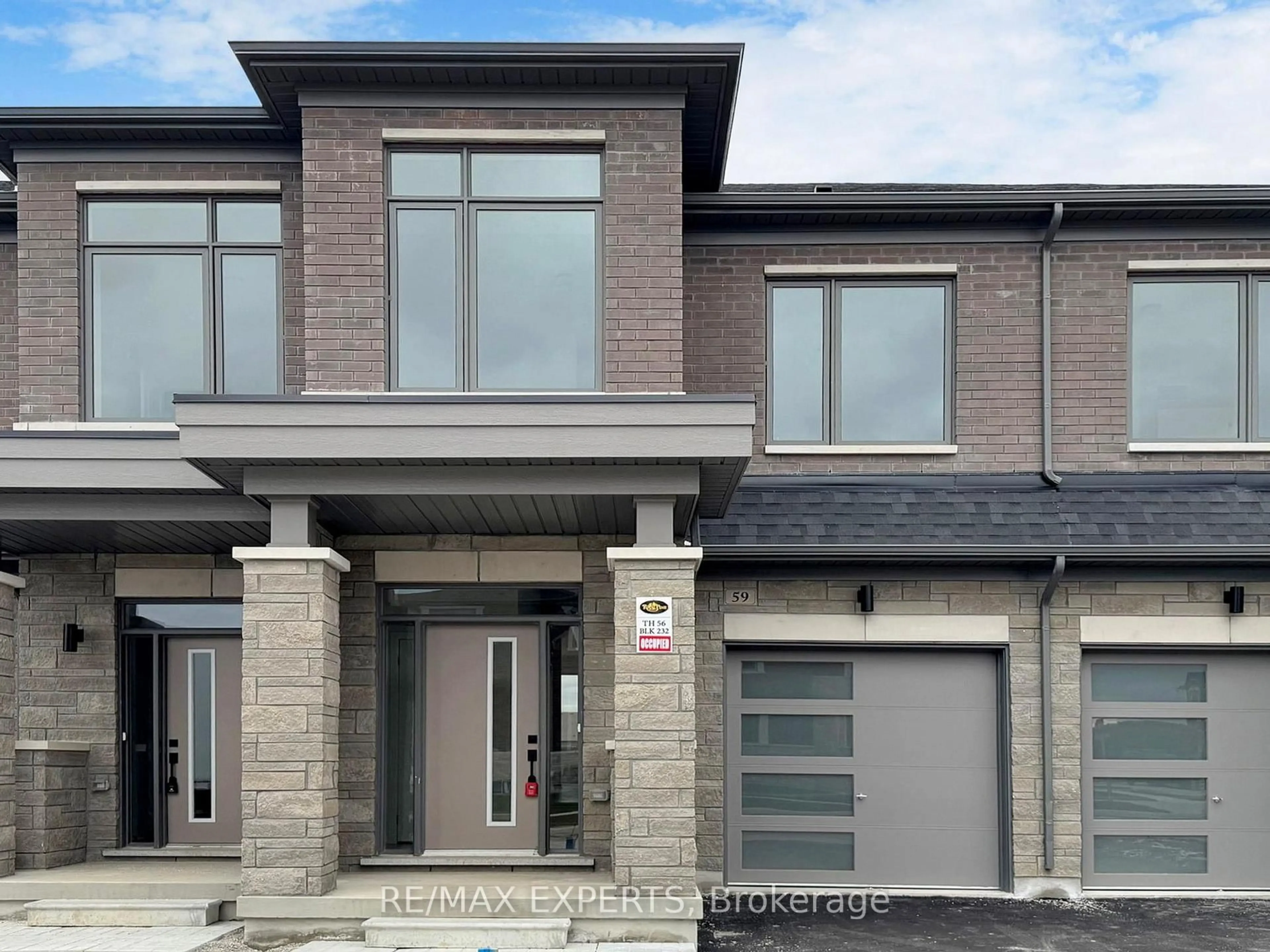 Home with brick exterior material, street for 59 Tipp Dr, Richmond Hill Ontario L4E 1A2