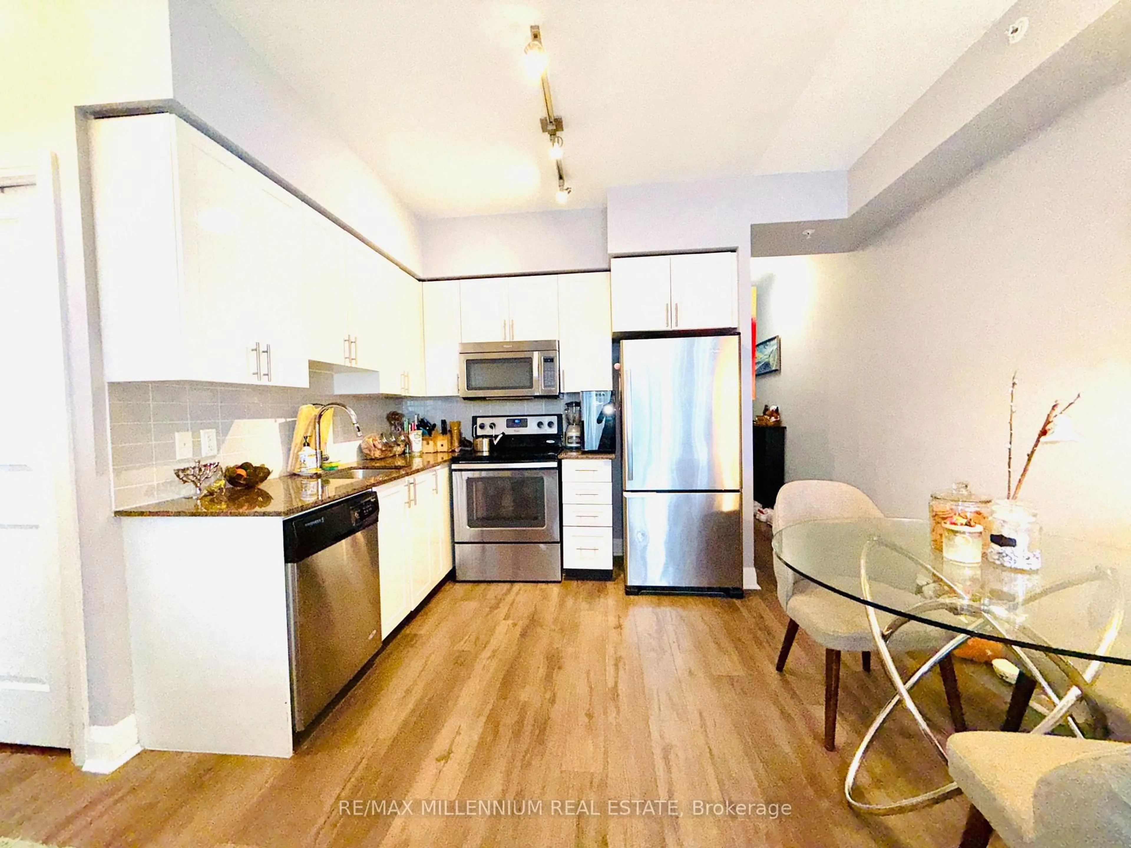 Open concept kitchen, wood/laminate floor for 85 North Park Rd #1415, Vaughan Ontario L3T 1S1