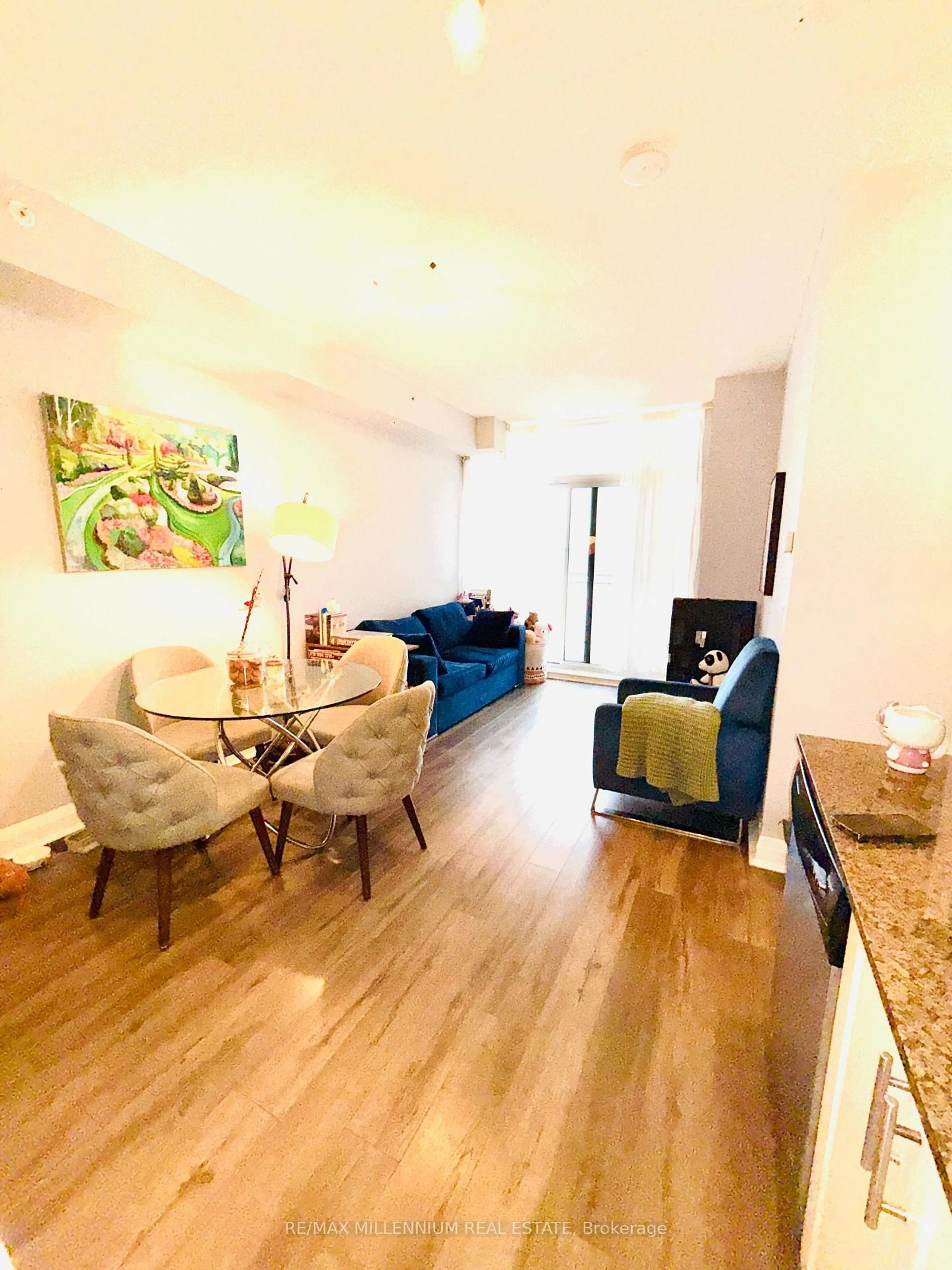 Living room with furniture, wood/laminate floor for 85 North Park Rd #1415, Vaughan Ontario L3T 1S1