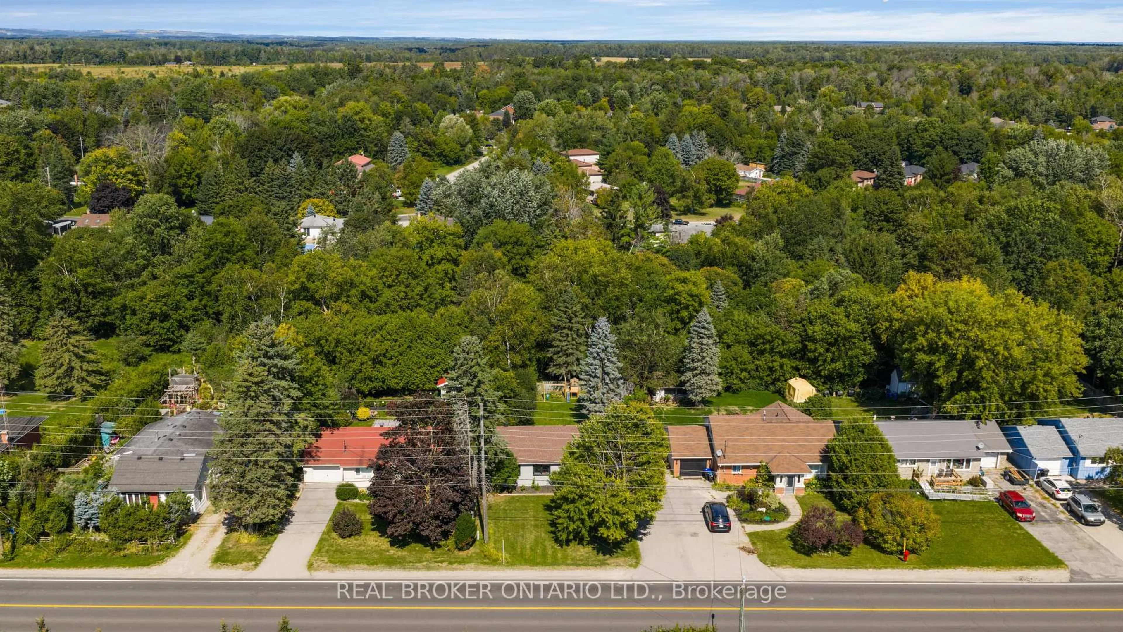 A pic from outside/outdoor area/front of a property/back of a property/a pic from drone, street for 7978 Main St, Adjala-Tosorontio Ontario L0M 1J0