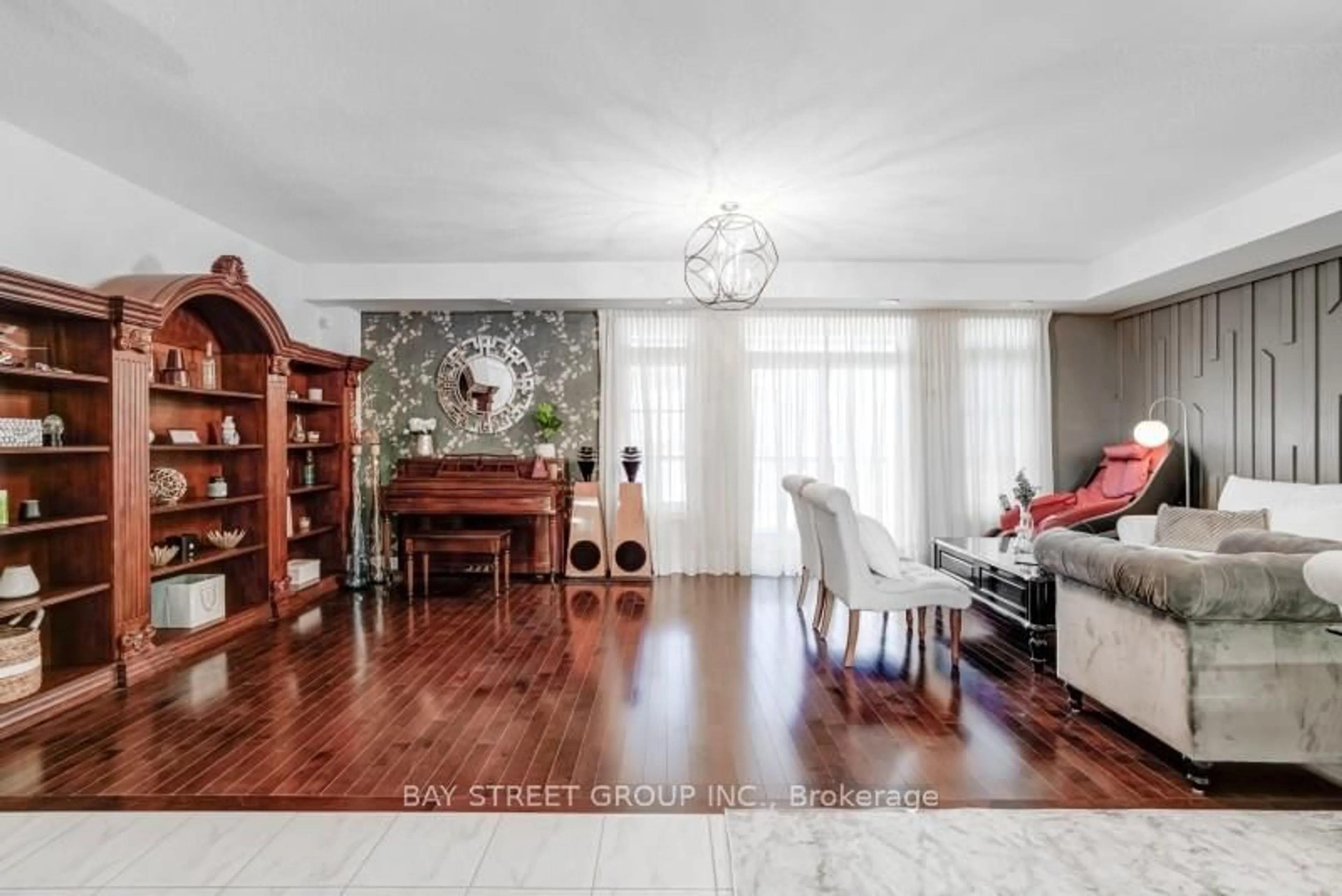Living room with furniture, wood/laminate floor for 121 Luzon Ave, Markham Ontario L6B 1N8