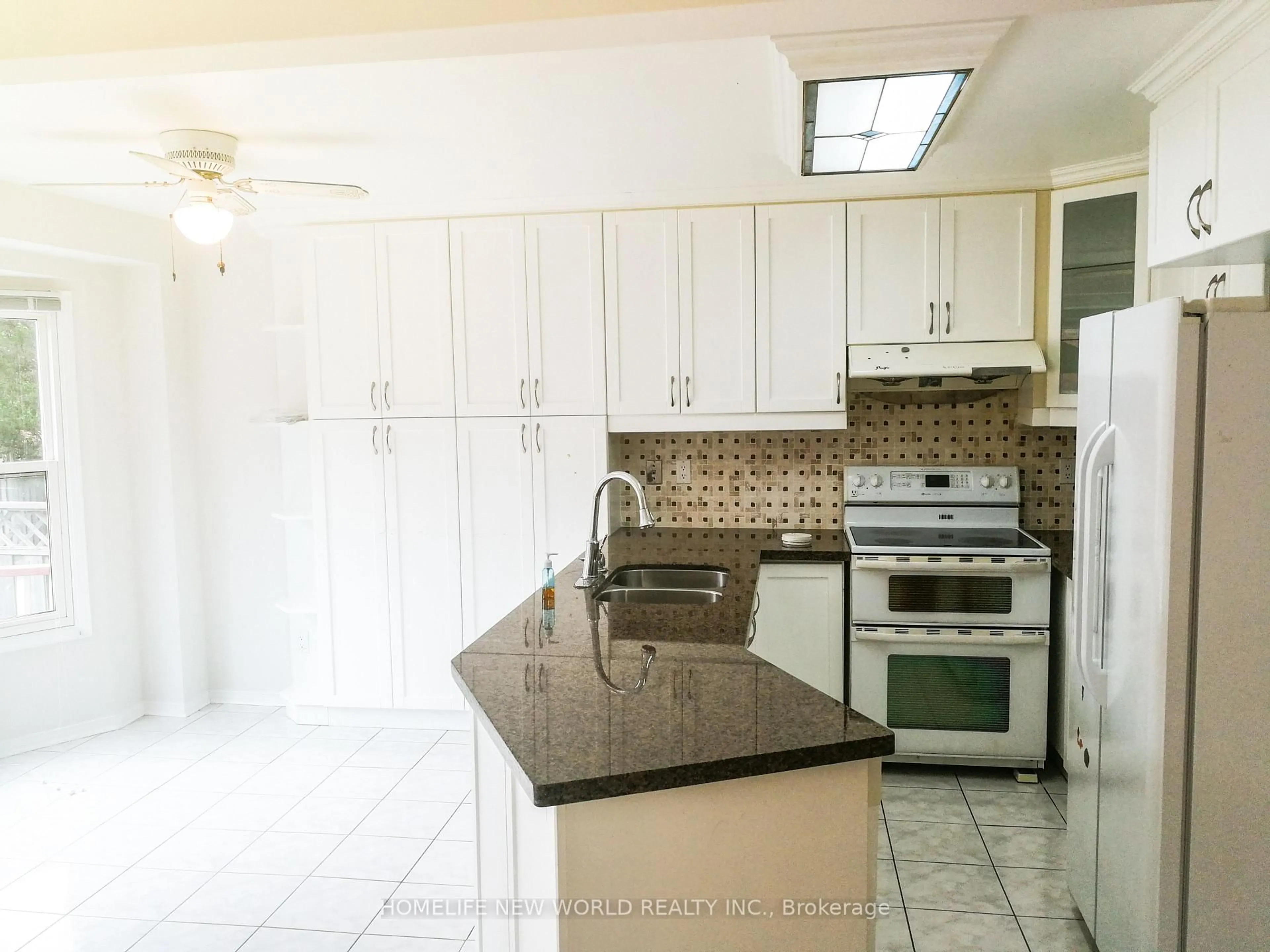 Standard kitchen, ceramic/tile floor for 68 Militia Tr, Markham Ontario L3R 9G7