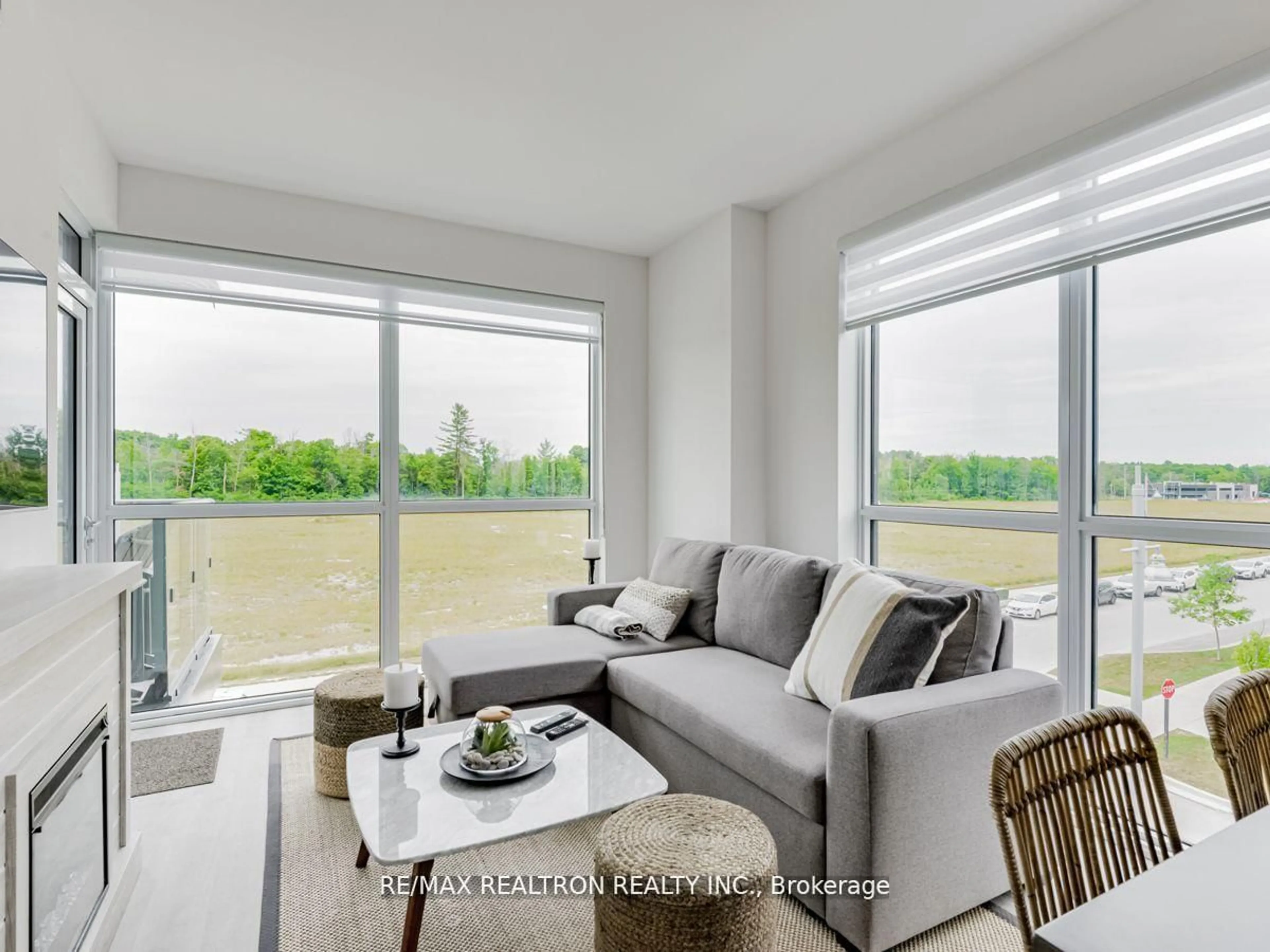 Living room with furniture, unknown for 375 Sea Ray Ave #310, Innisfil Ontario L9S 0N9