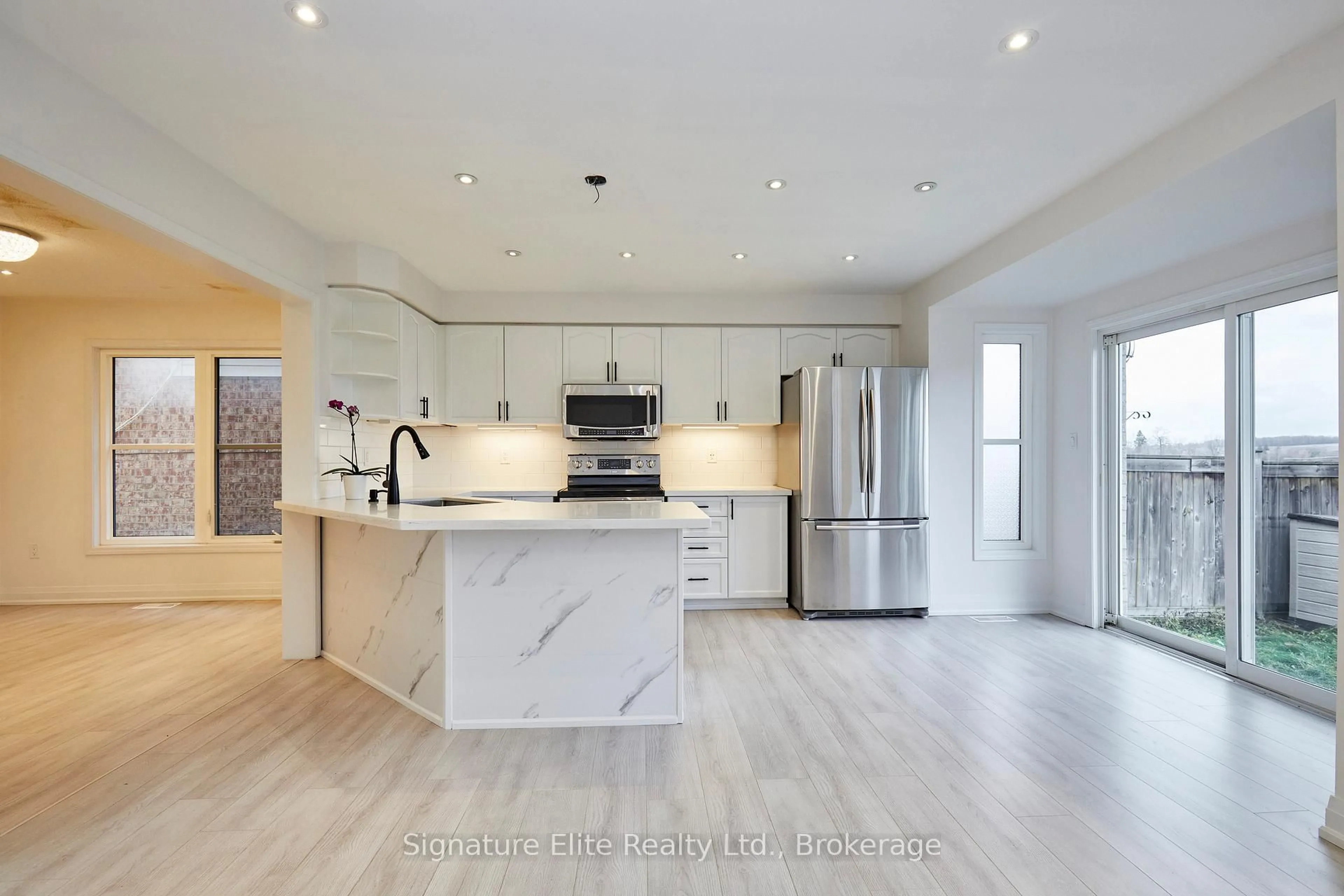 Open concept kitchen, unknown for 58 John W Taylor Ave, New Tecumseth Ontario L9R 0E1