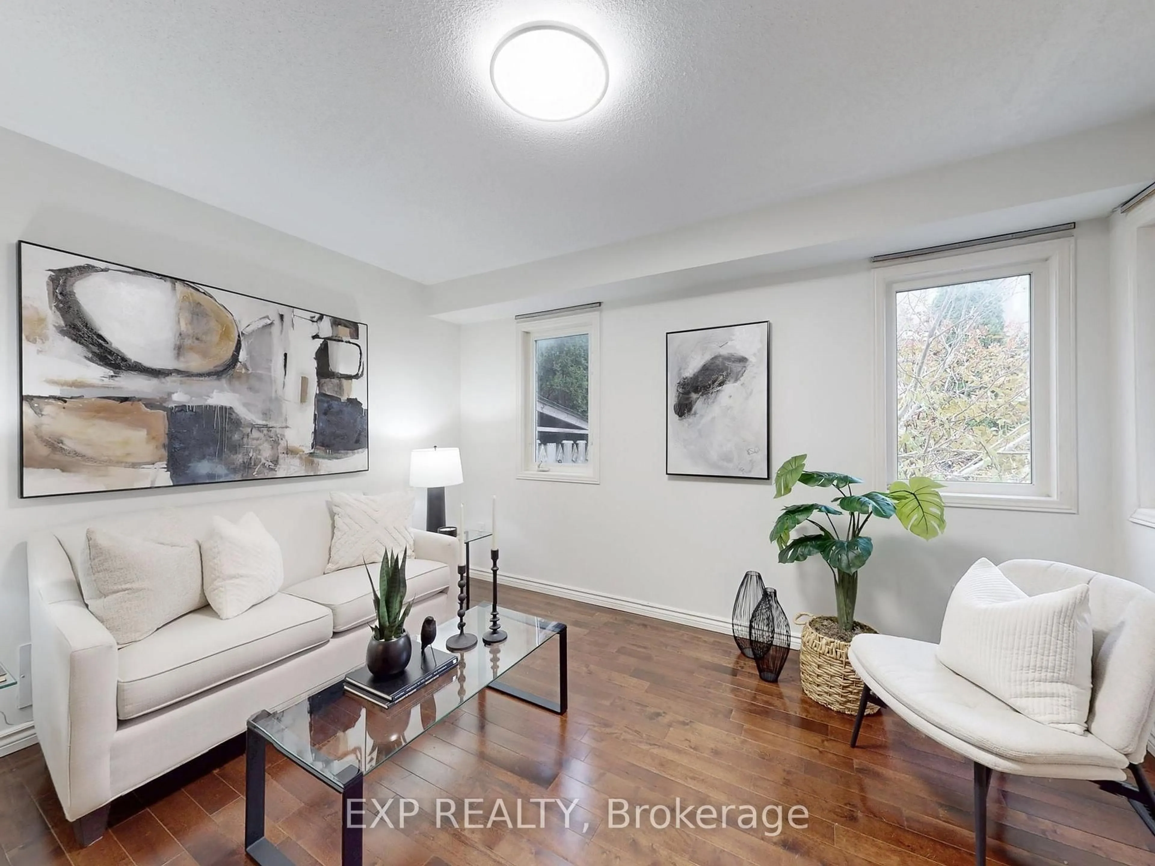 Living room with furniture, wood/laminate floor for 98 Lowther Ave, Richmond Hill Ontario L4E 4P3