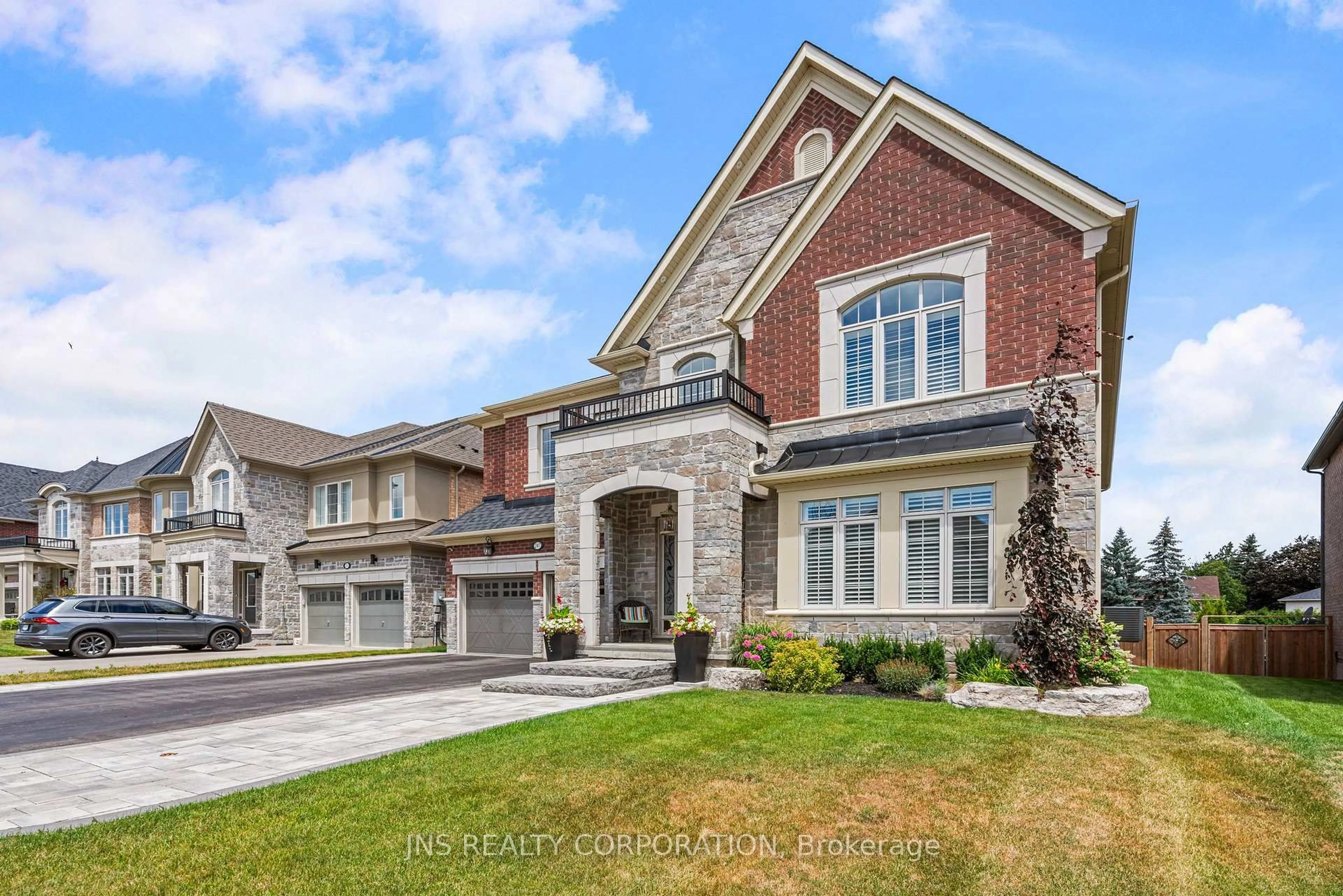 Home with brick exterior material, street for 247 Reg Harrison Tr, Newmarket Ontario L3X 0M4