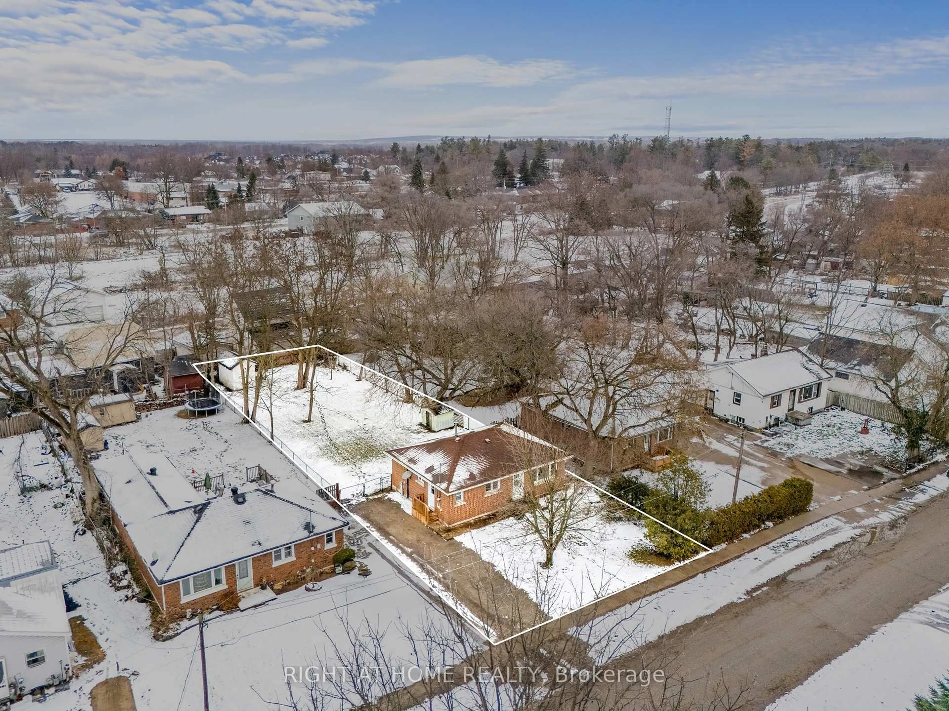 A pic from outside/outdoor area/front of a property/back of a property/a pic from drone, street for 81 Jonas St, Essa Ontario L0M 1B0