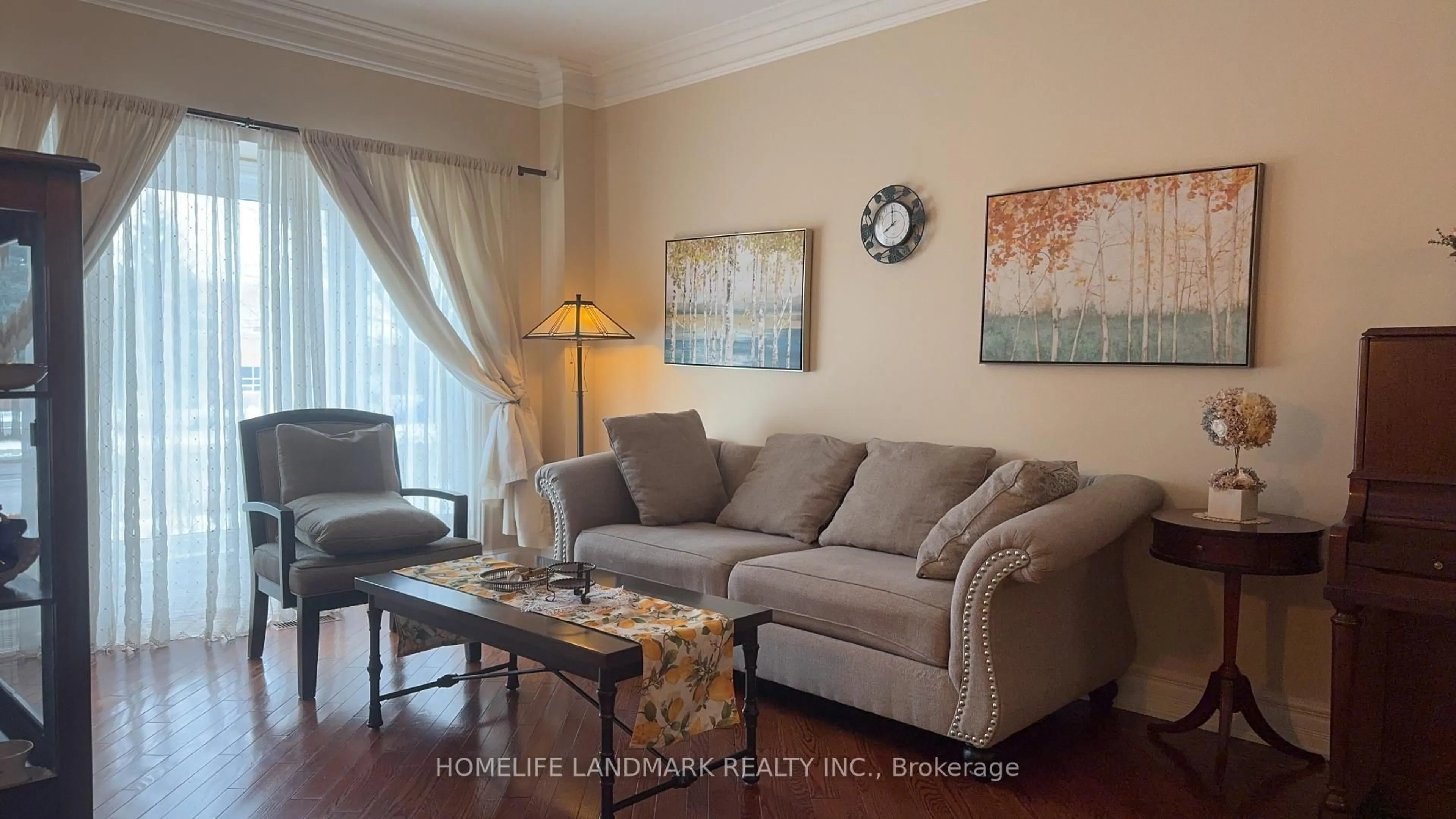 Living room with furniture, wood/laminate floor for 136 Worth Blvd, Vaughan Ontario L4J 7V5
