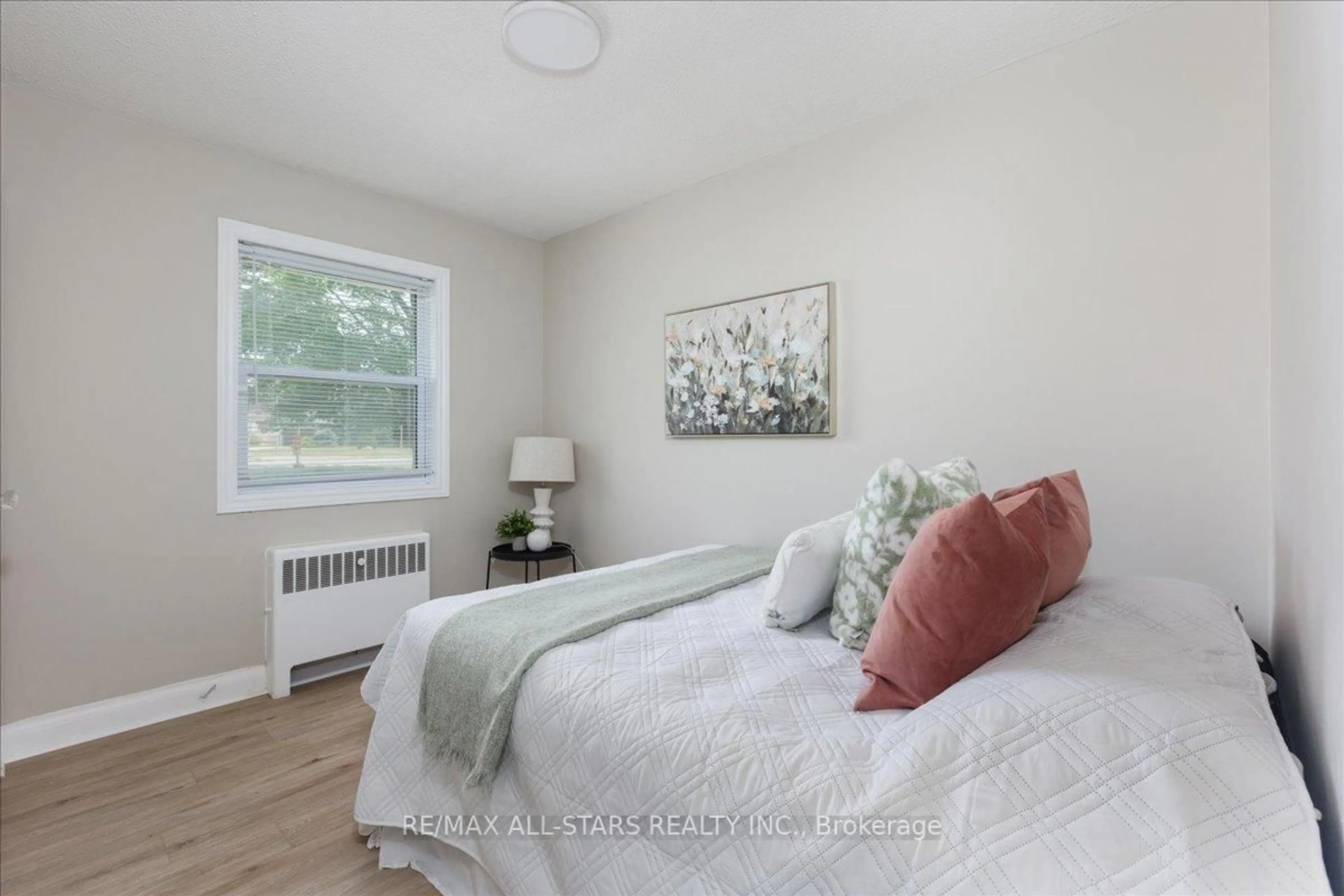 Bedroom with bed, wood/laminate floor for 84 Metro Rd, Georgina Ontario L4P 1C4