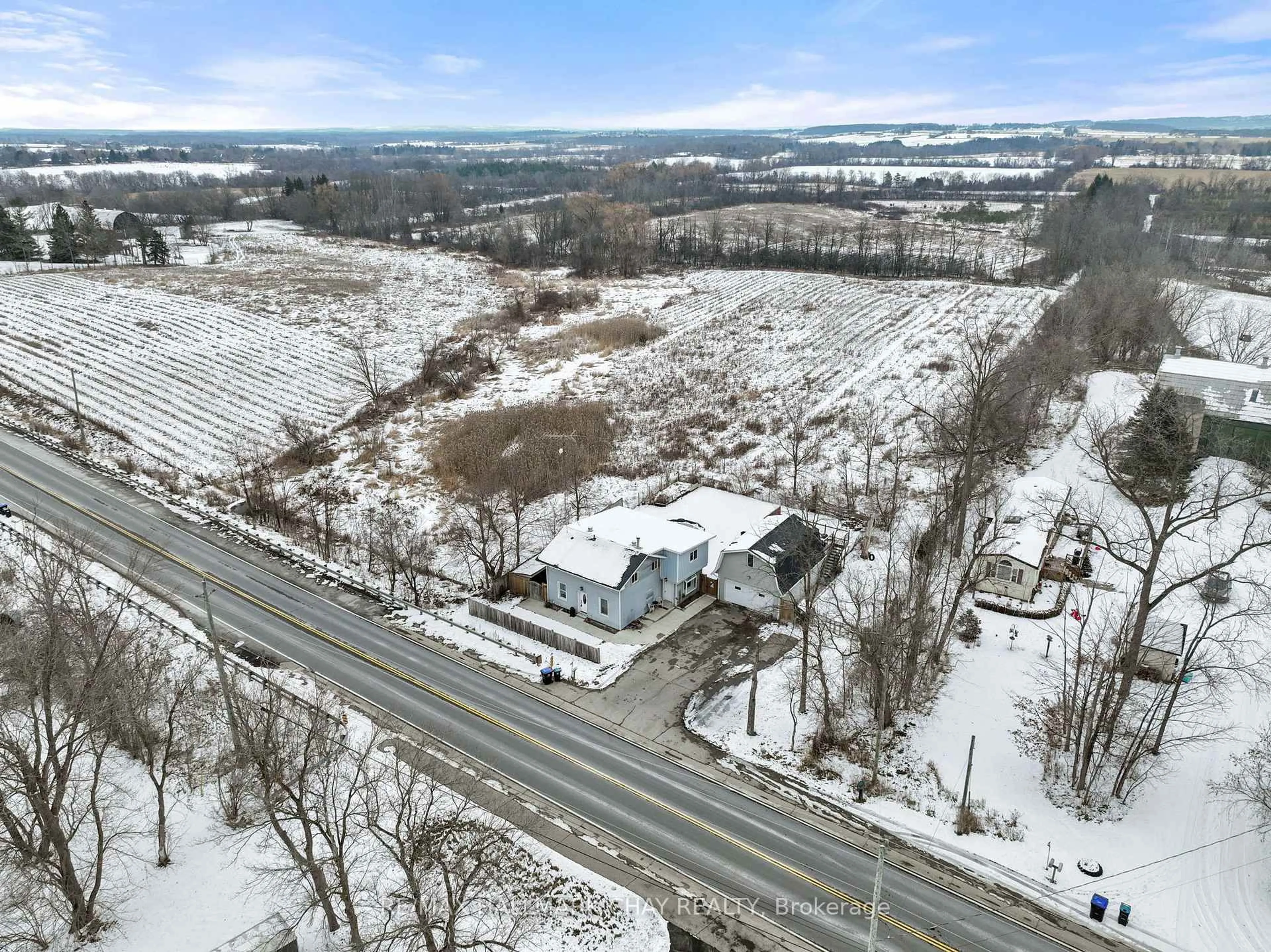 A pic from outside/outdoor area/front of a property/back of a property/a pic from drone, street for 2545 County Rd 50, Adjala-Tosorontio Ontario L0G 1L0