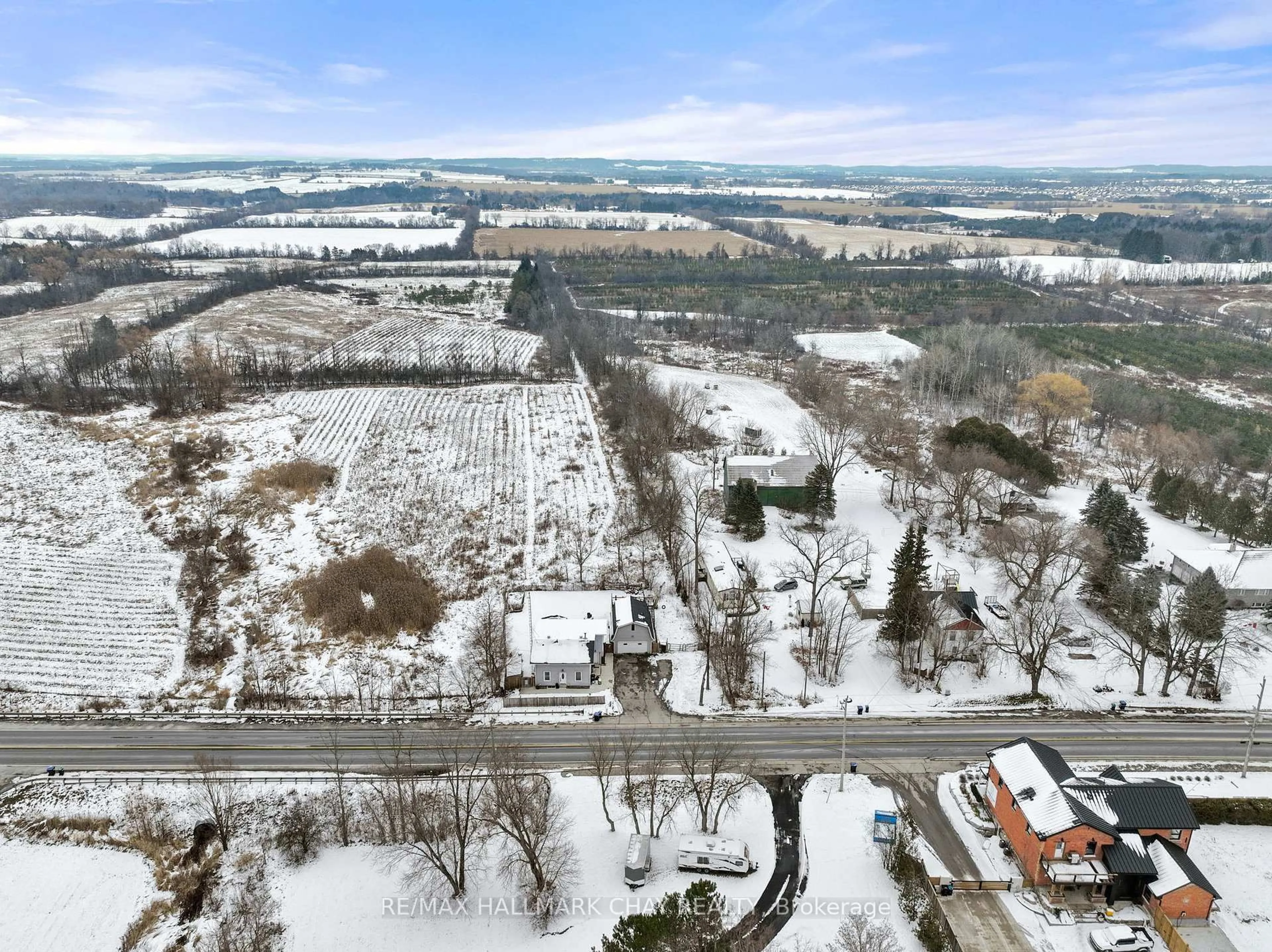 A pic from outside/outdoor area/front of a property/back of a property/a pic from drone, street for 2545 County Rd 50, Adjala-Tosorontio Ontario L0G 1L0