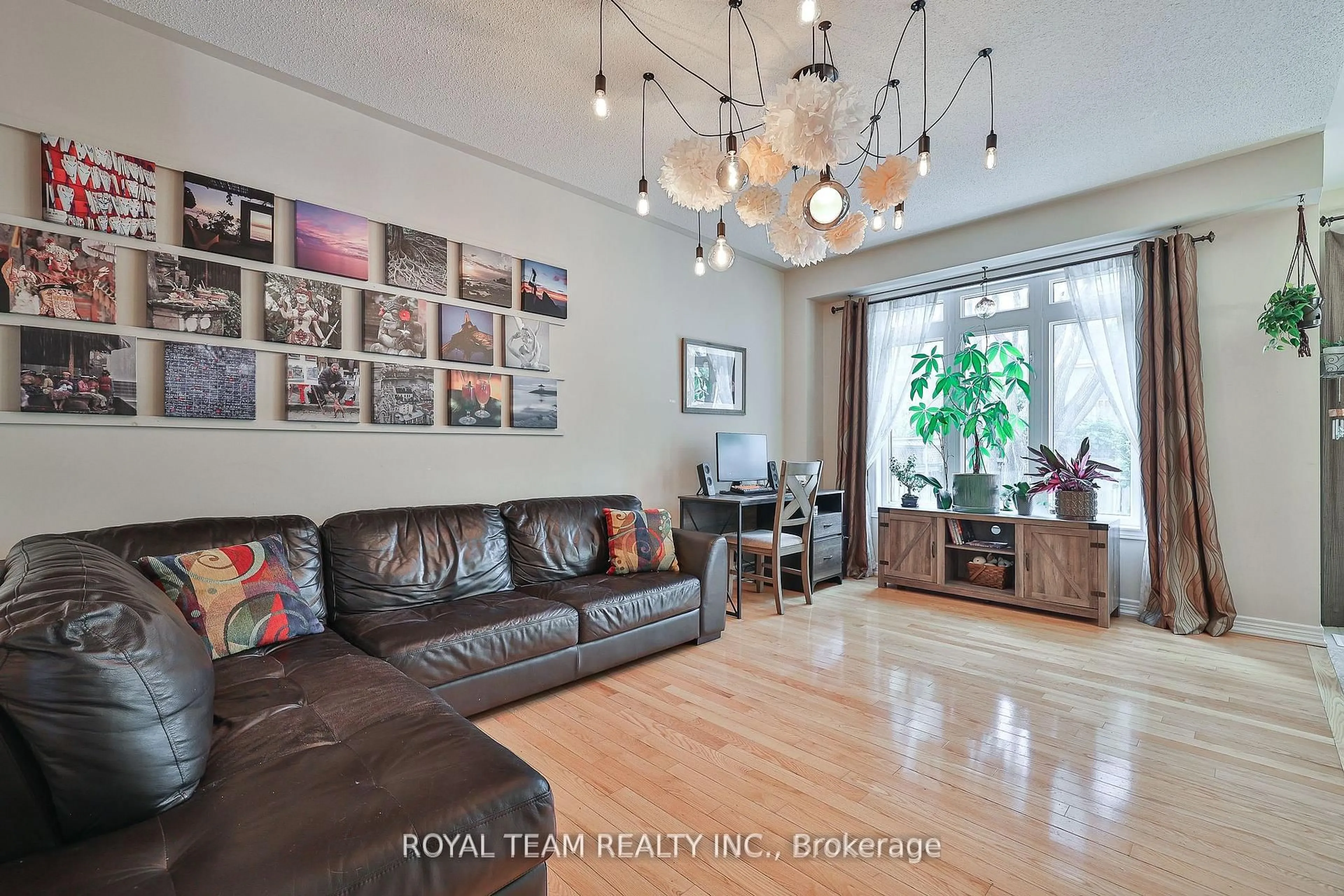 Living room with furniture, wood/laminate floor for 76 Degas Dr, Vaughan Ontario L4J 9J3