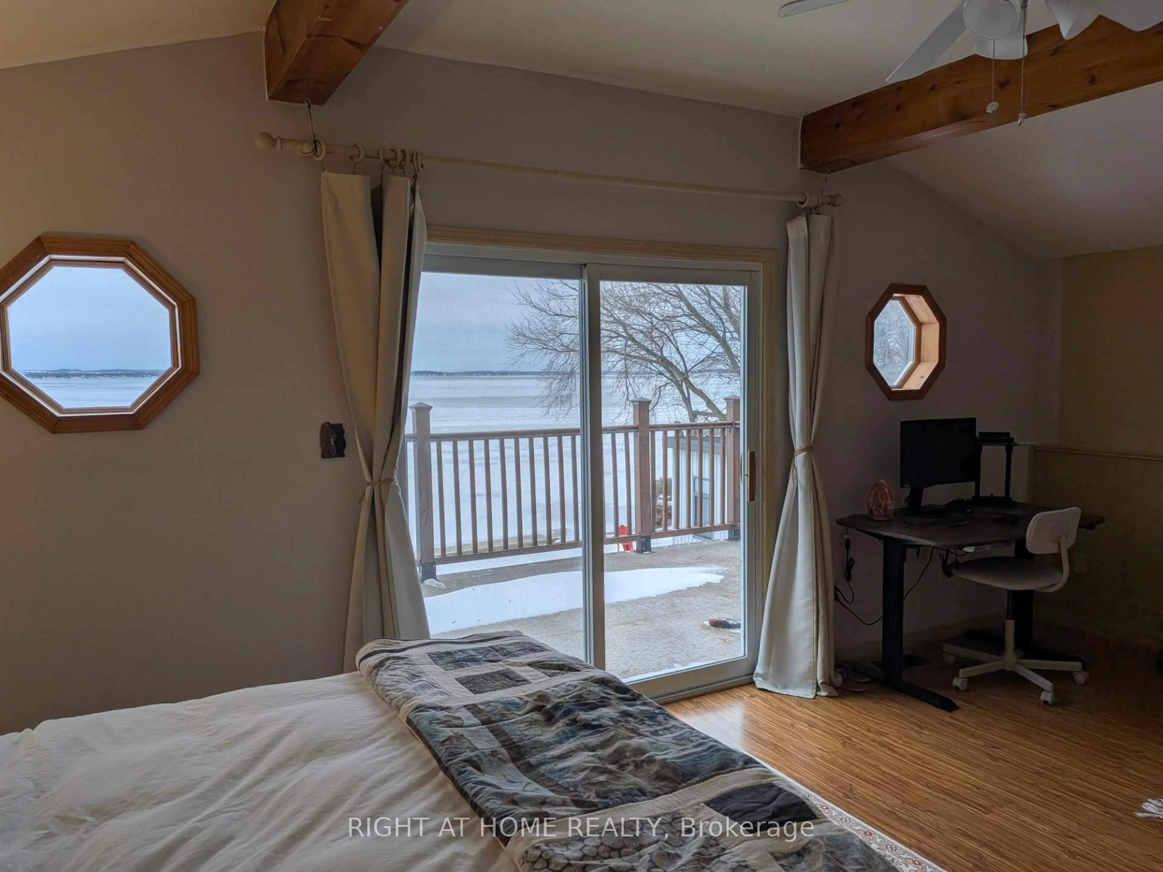 Bedroom with bed, wood/laminate floor for 36 Shirlea Blvd, Georgina Ontario L4P 1K9