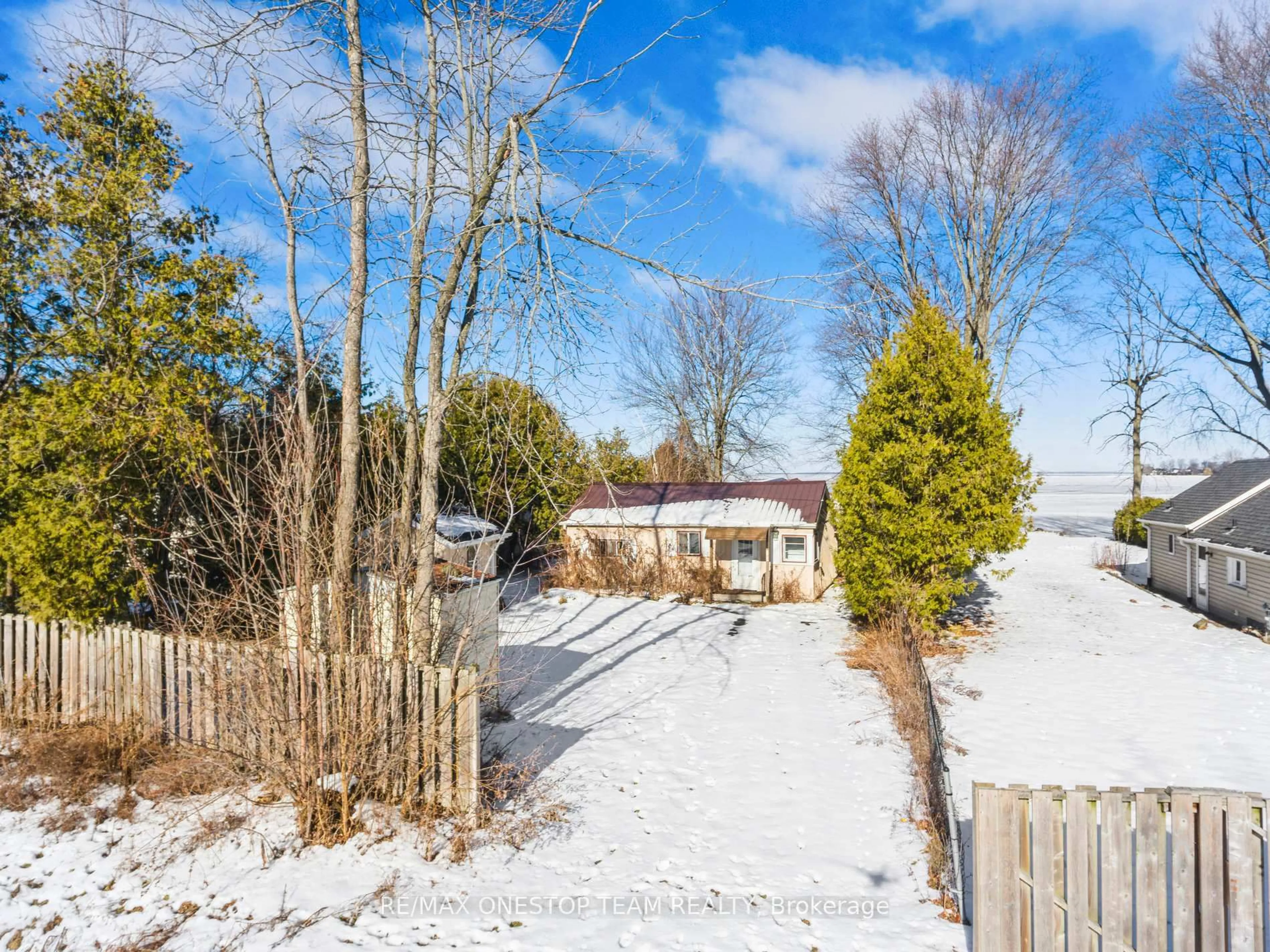 A pic from outside/outdoor area/front of a property/back of a property/a pic from drone, unknown for 108 Moore's Beach Rd, Georgina Ontario L0E 1N0