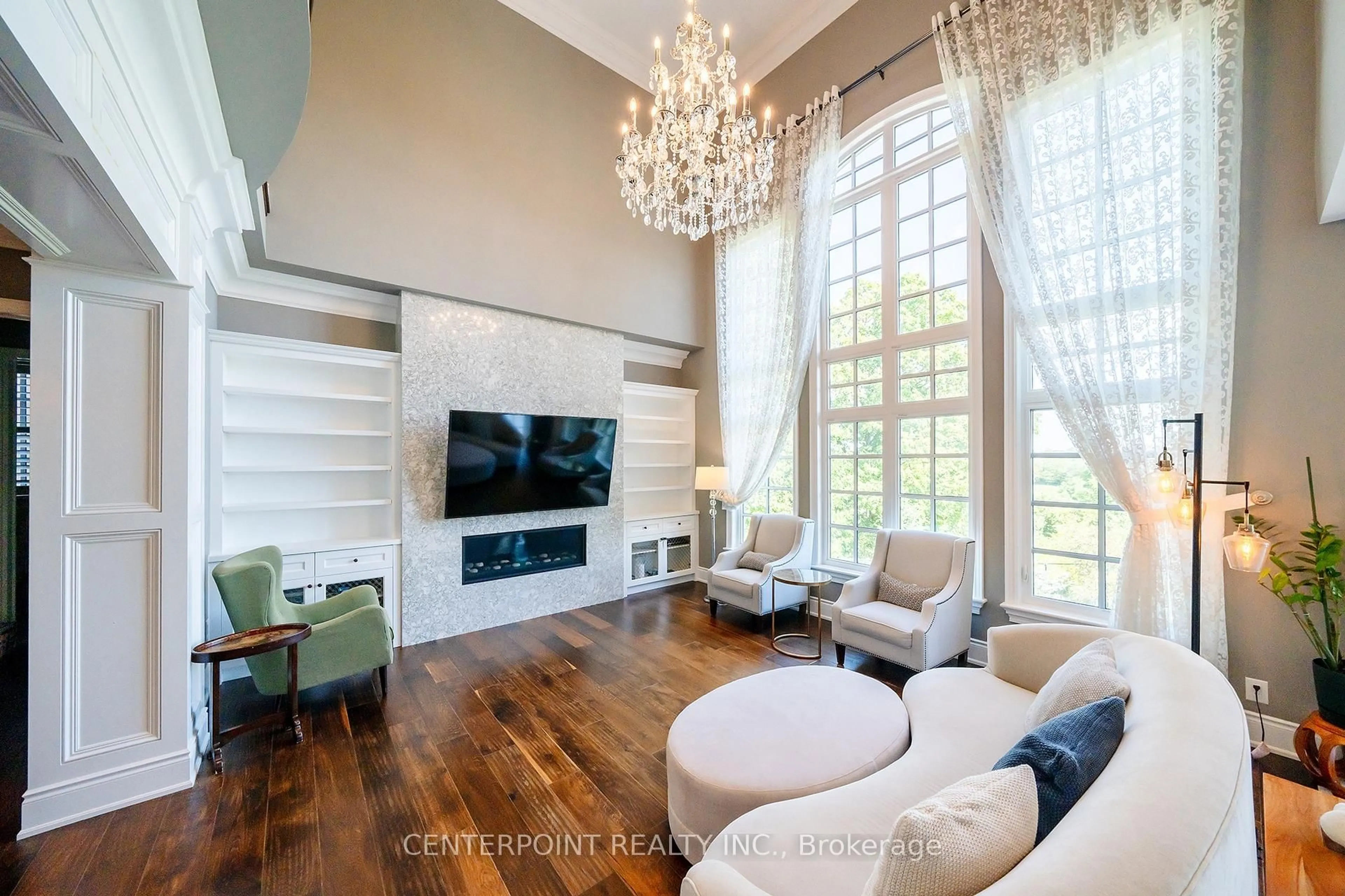 Living room with furniture, wood/laminate floor for 190 Angus Glen Blvd, Markham Ontario L6C 0K1