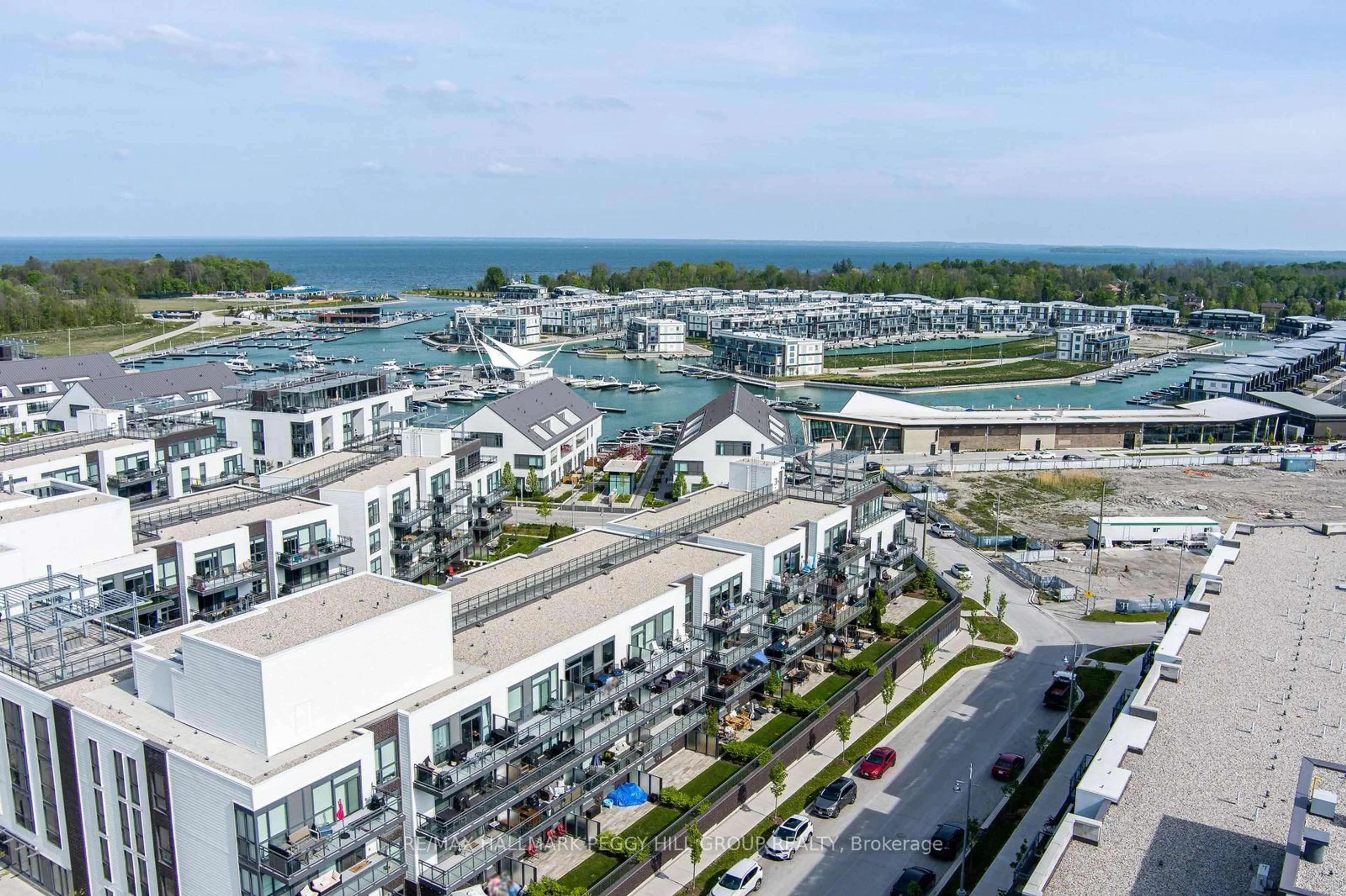 A pic from outside/outdoor area/front of a property/back of a property/a pic from drone, unknown for 333 Sea Ray Ave #131, Innisfil Ontario L9S 0M3