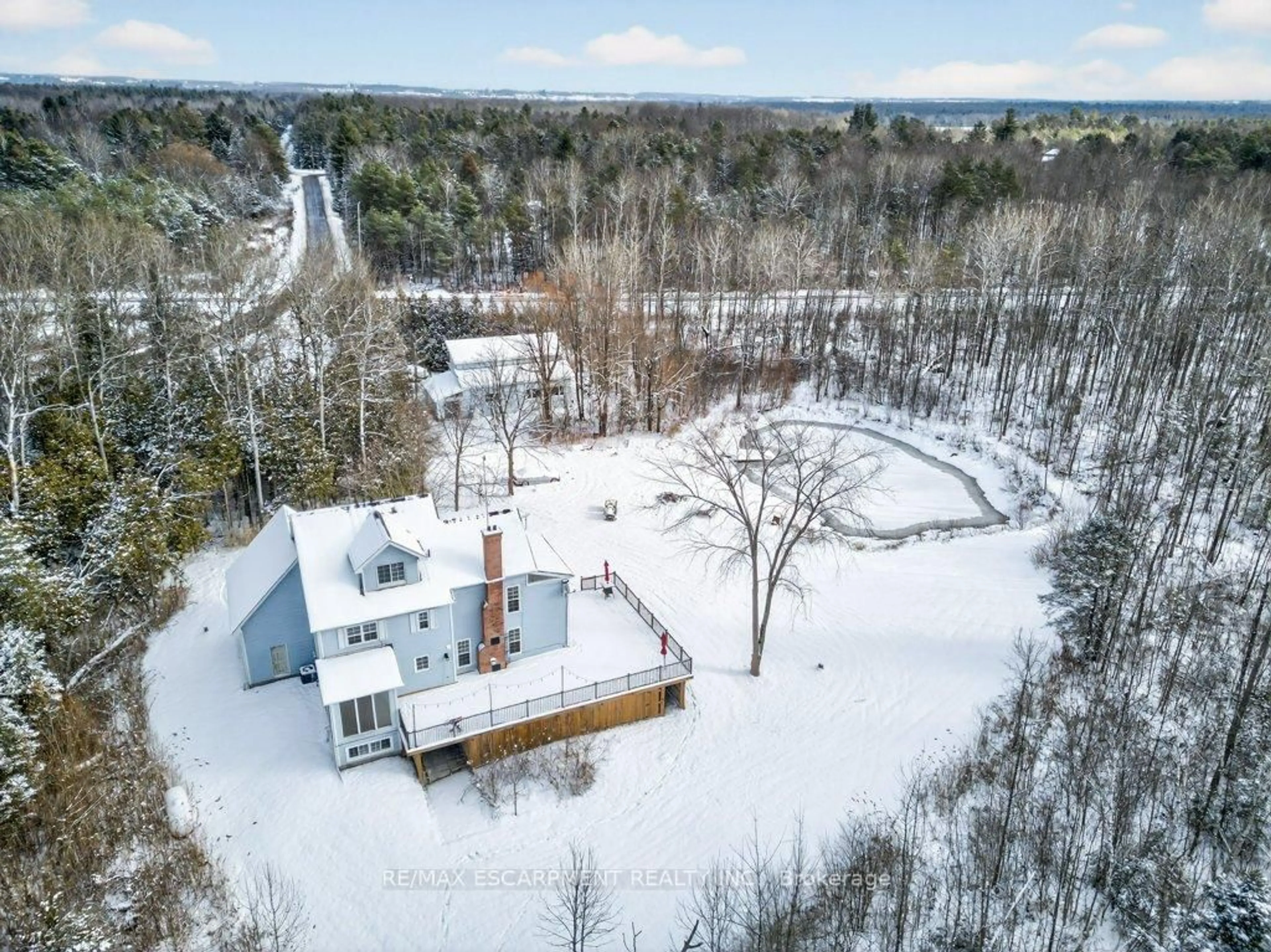 A pic from outside/outdoor area/front of a property/back of a property/a pic from drone, unknown for 7460 5th Line, Essa Ontario L0M 1B1