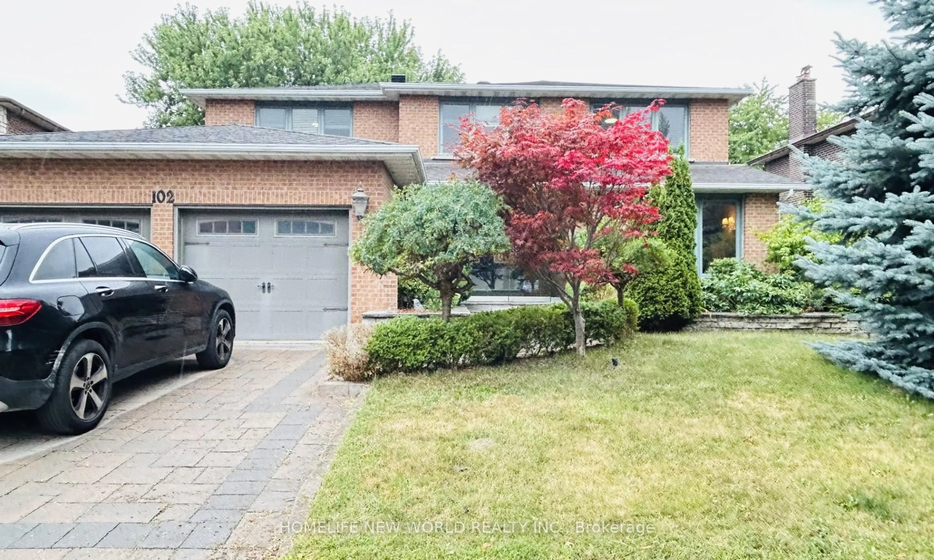 Home with brick exterior material, street for 102 Willowbrook Rd, Markham Ontario L3T 5P5