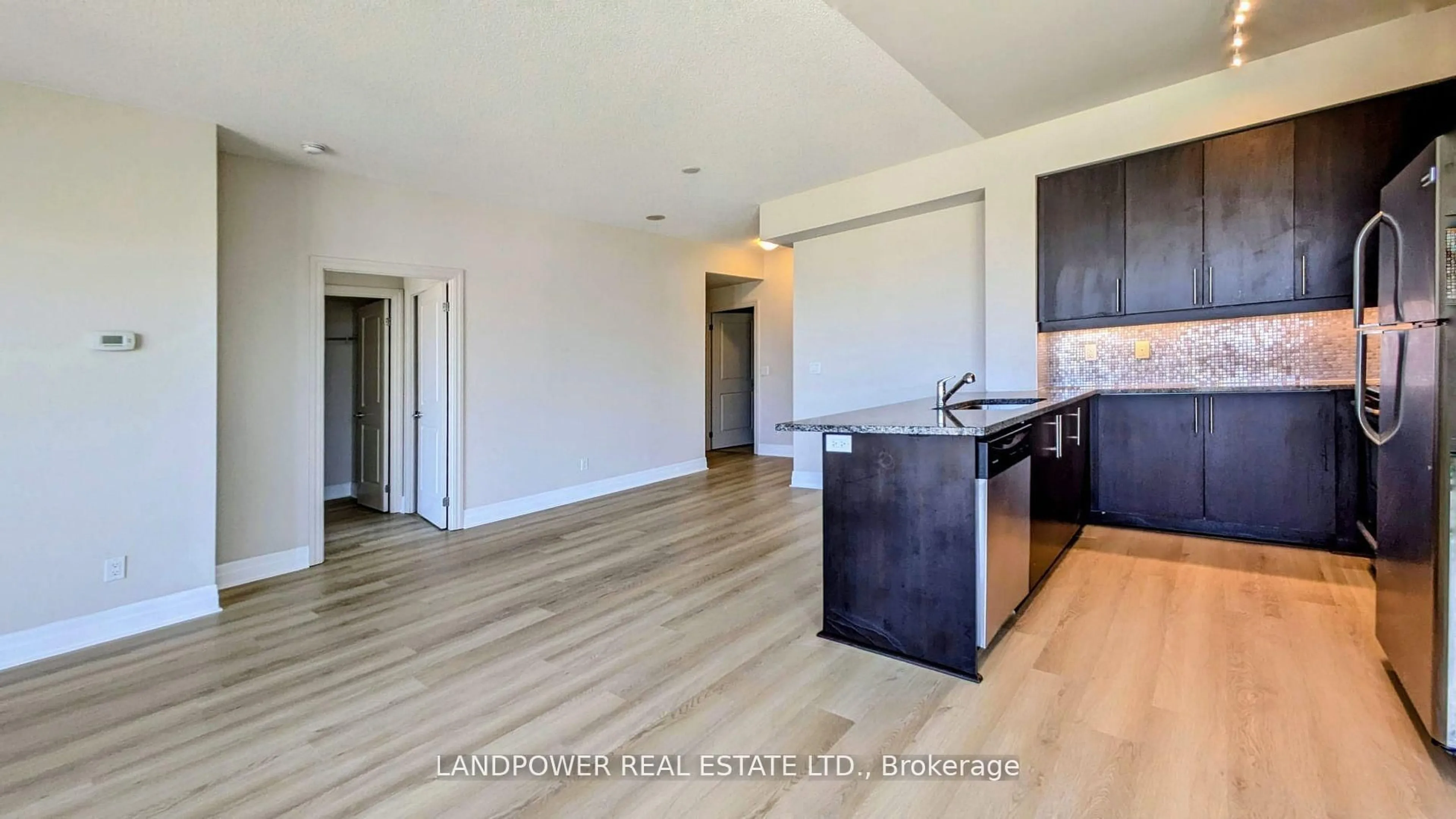 Open concept kitchen, wood/laminate floor for 8130 Birchmount Rd #415, Markham Ontario L6G 0E4