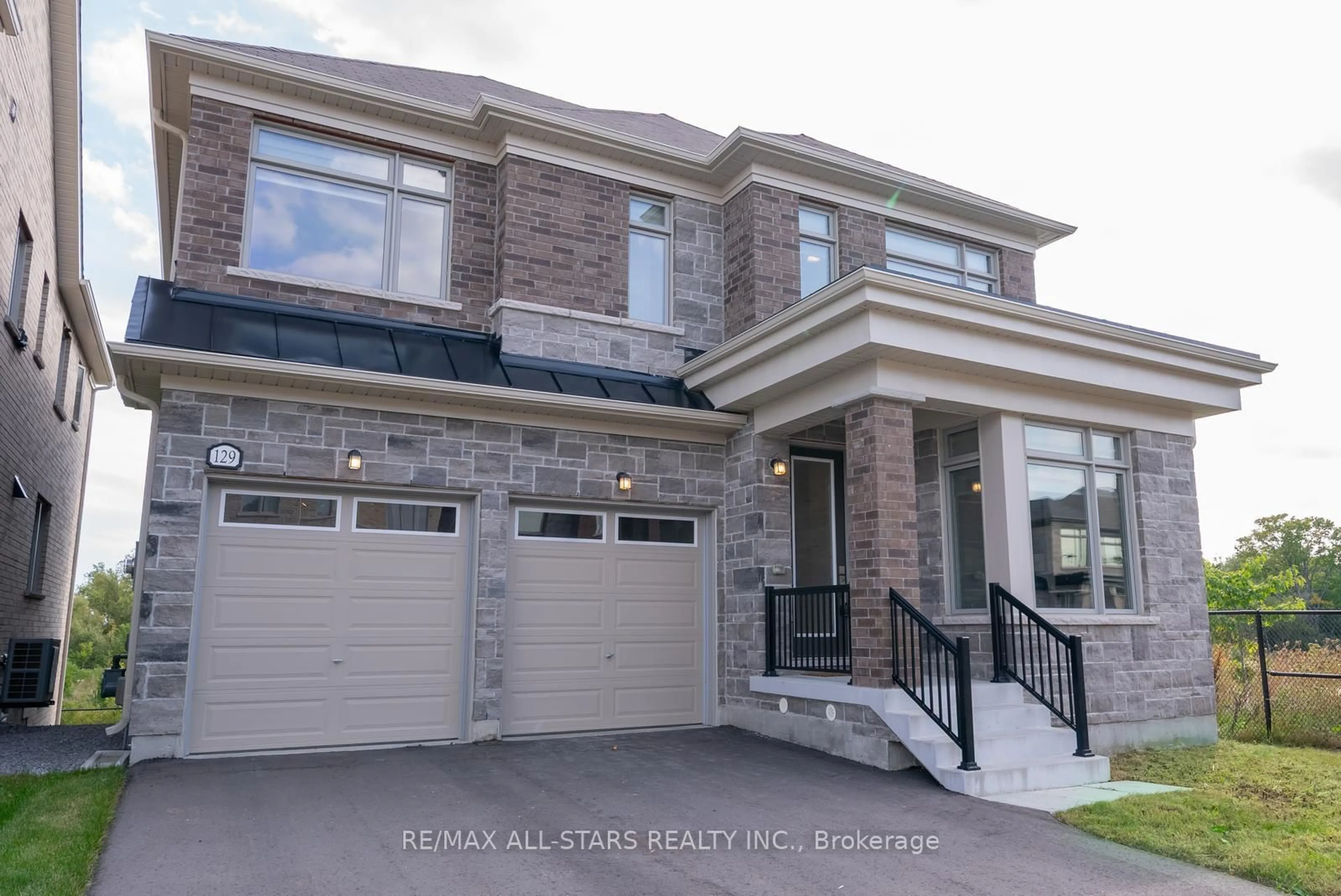Home with brick exterior material, street for 129 Busato Dr, Whitchurch-Stouffville Ontario L4A 4V6