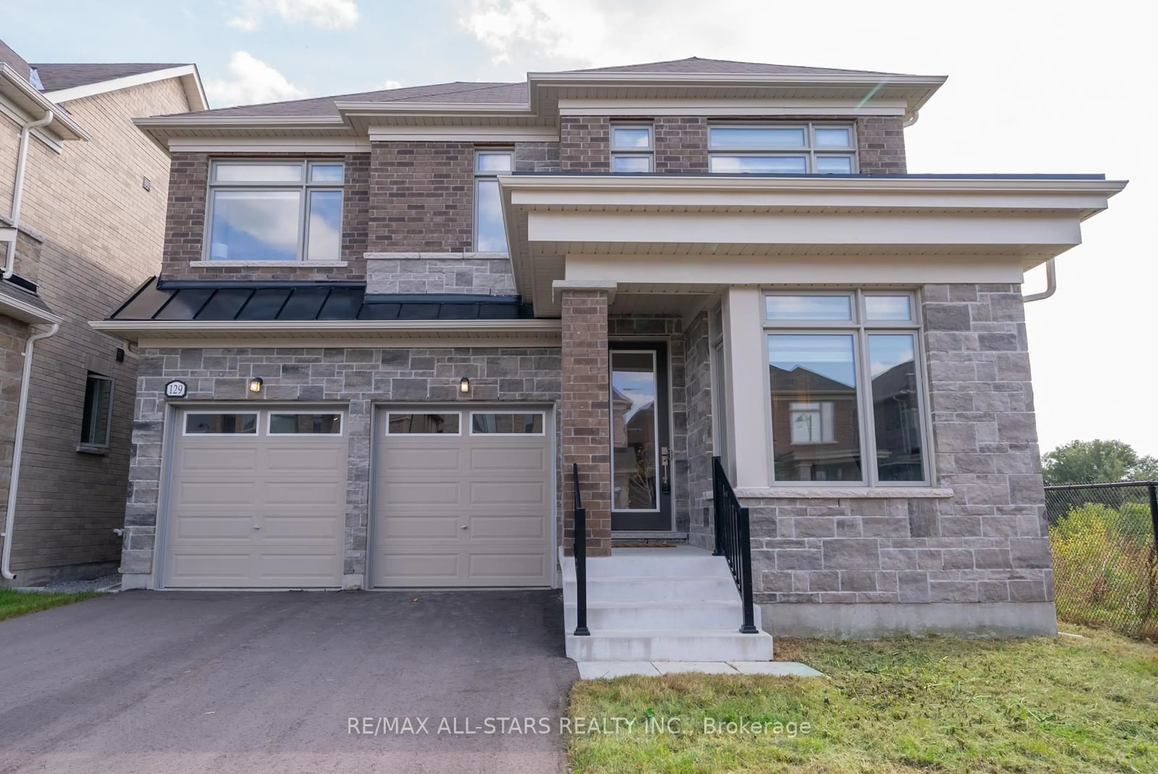 Home with brick exterior material, street for 129 Busato Dr, Whitchurch-Stouffville Ontario L4A 4V6