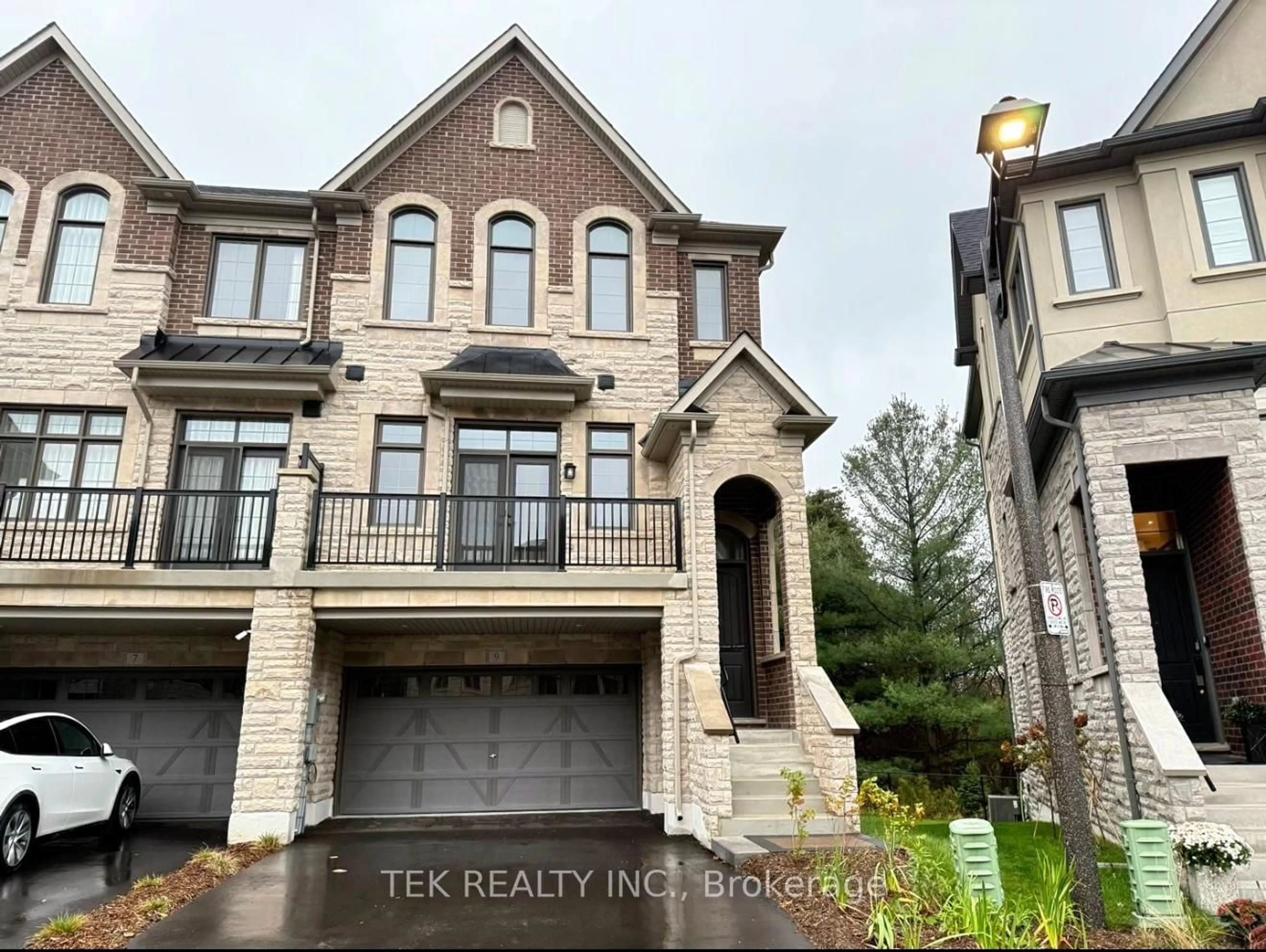 Home with brick exterior material, street for 9 West Village Lane, Markham Ontario L6C 3L5