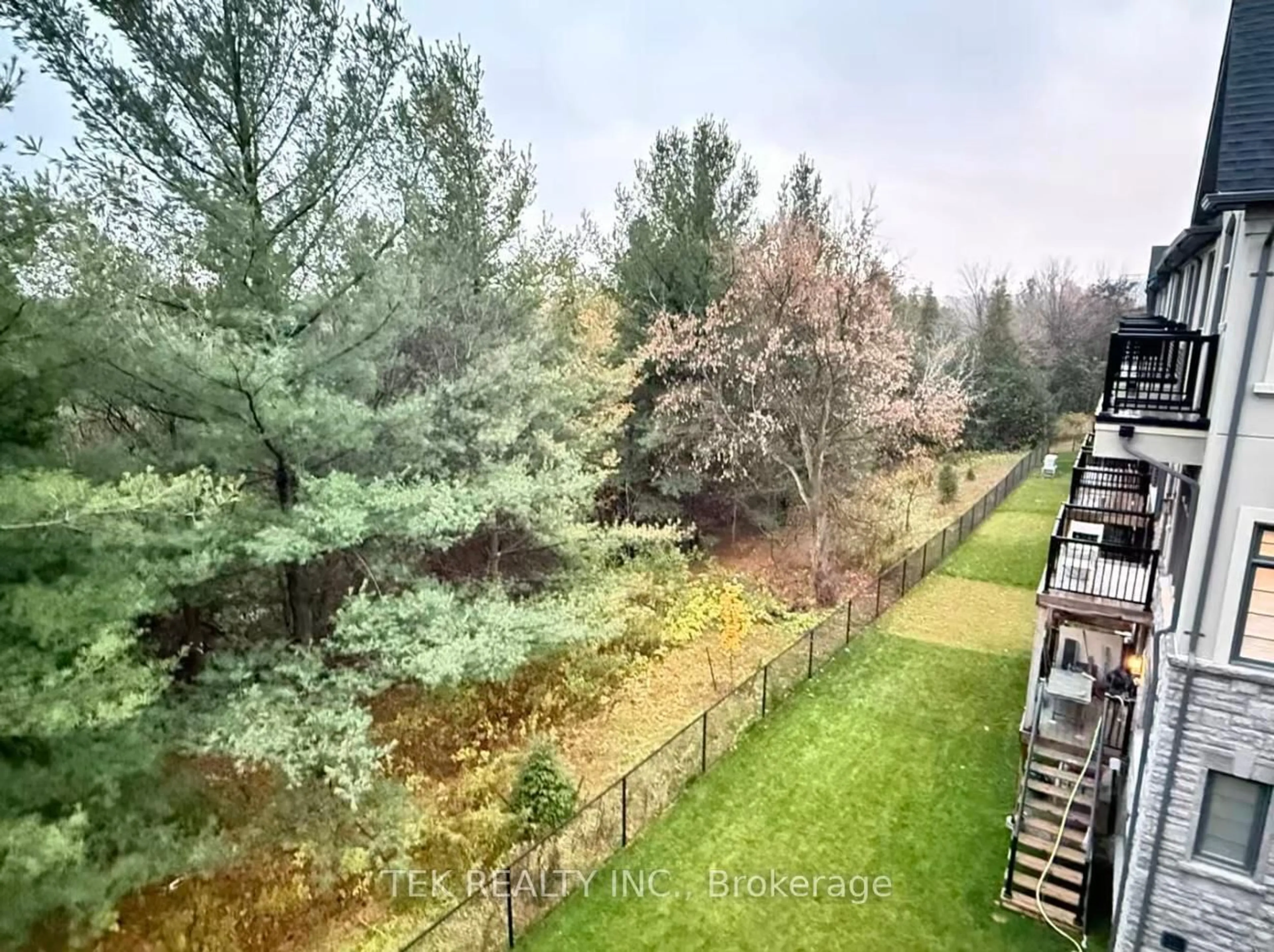 A pic from outside/outdoor area/front of a property/back of a property/a pic from drone, forest/trees view for 9 West Village Lane, Markham Ontario L6C 3L5