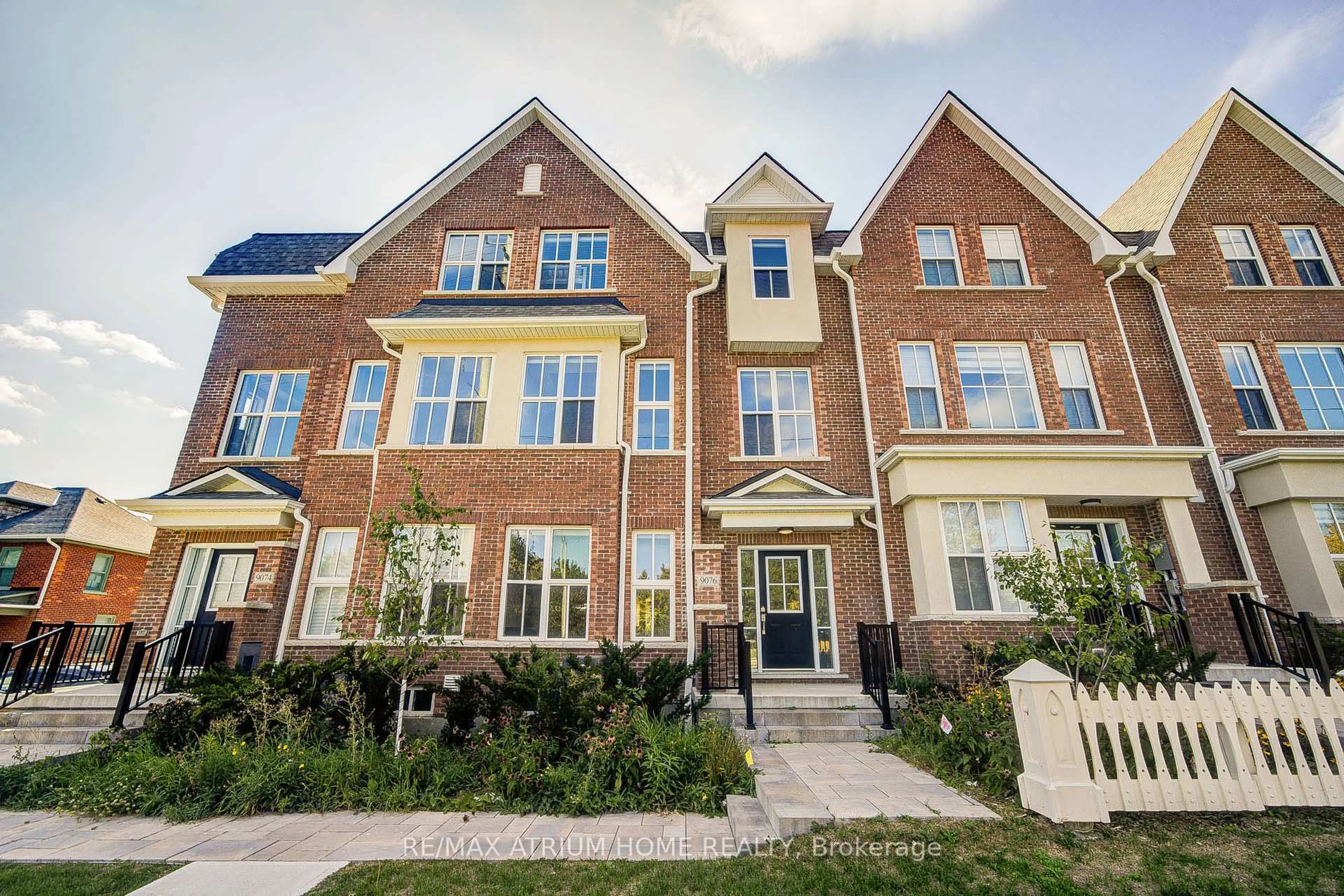 Home with brick exterior material, street for 9076 Woodbine Ave, Markham Ontario L3R 0J8