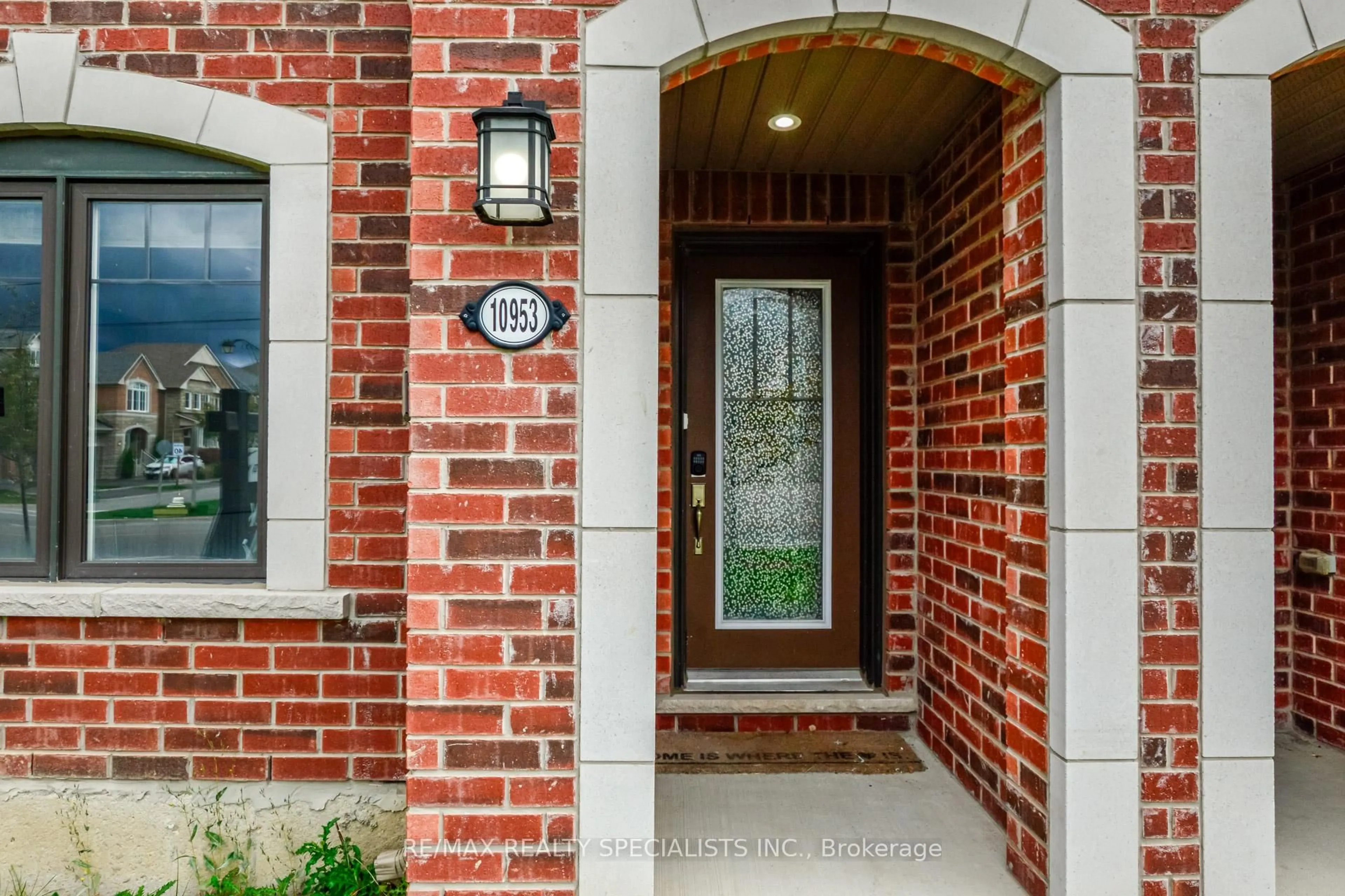 Home with brick exterior material, street for 10953 VICTORIA SQUARE Blvd, Markham Ontario L6C 0Z2