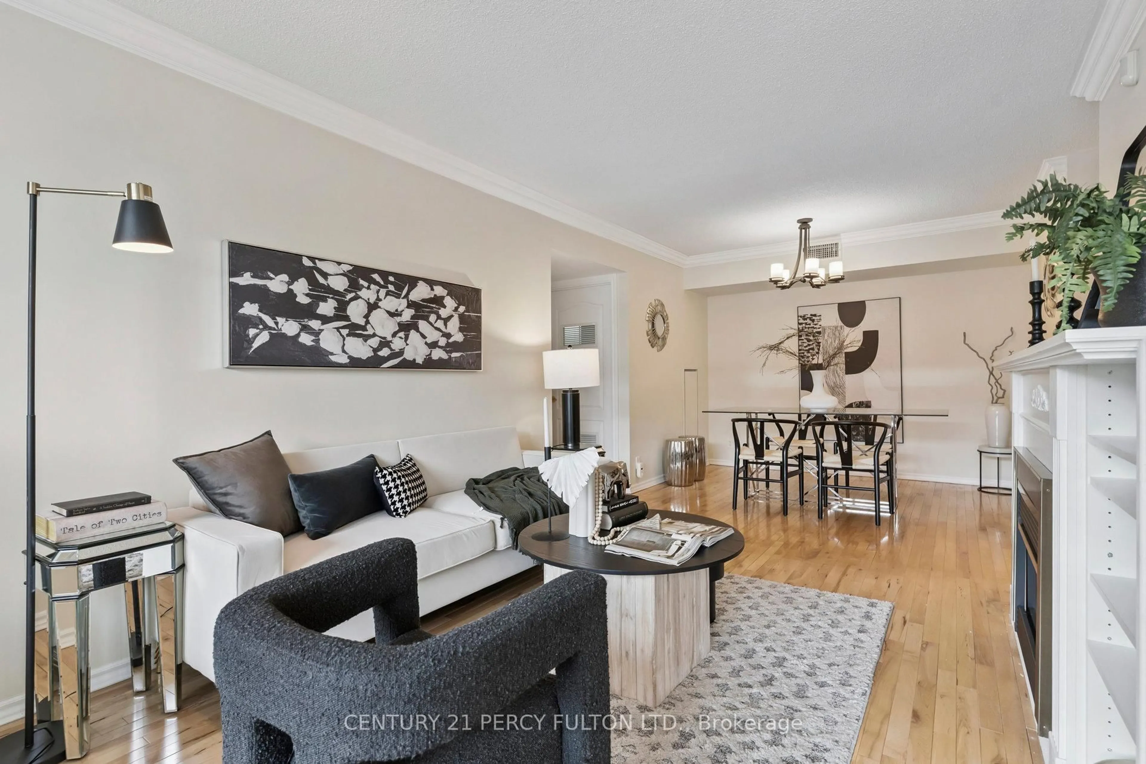 Living room with furniture, wood/laminate floor for 55 The Boardwalk Way #309, Markham Ontario L6E 1B7