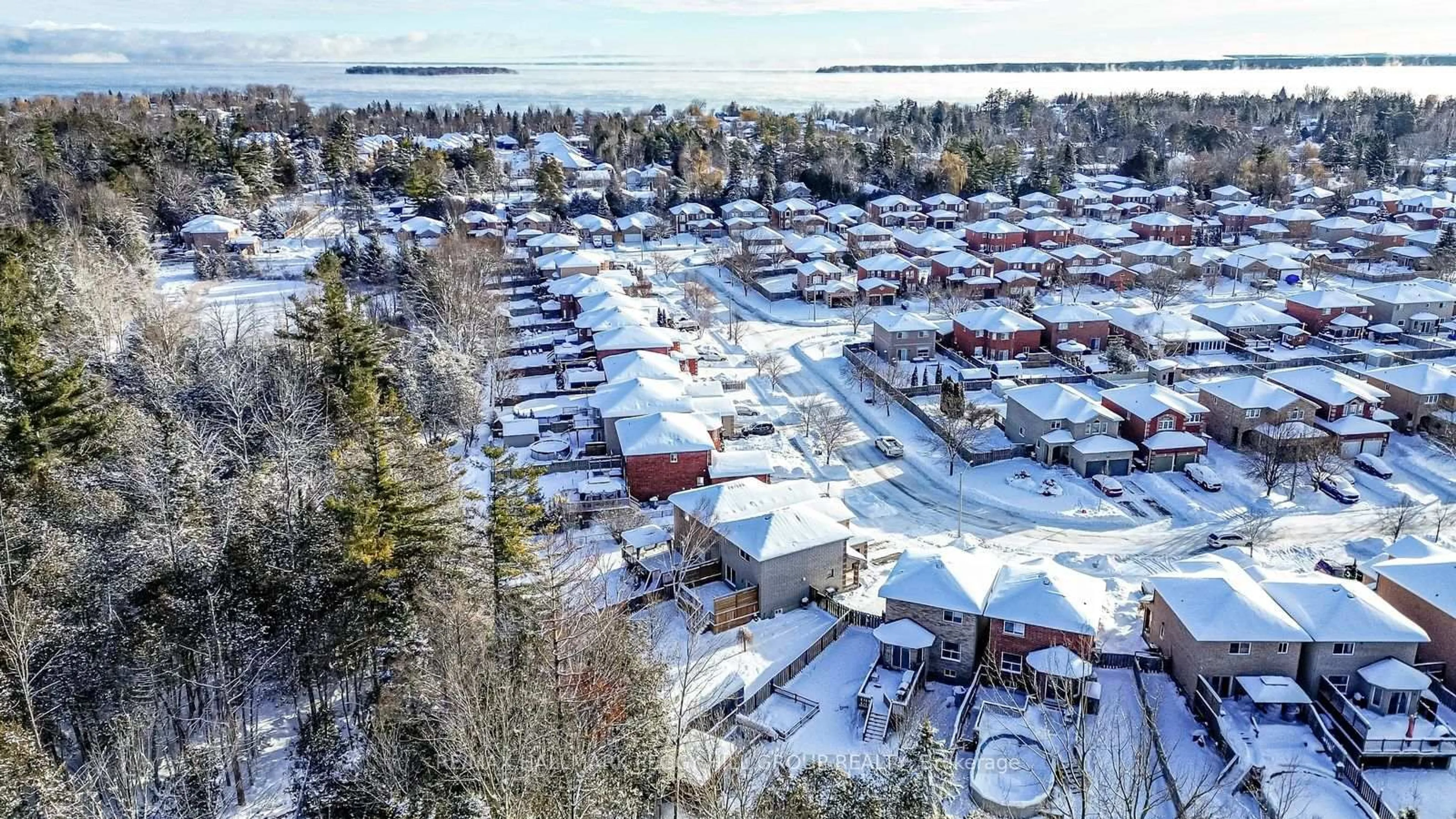 A pic from outside/outdoor area/front of a property/back of a property/a pic from drone, street for 2320 Warrington Way, Innisfil Ontario L9S 4V1