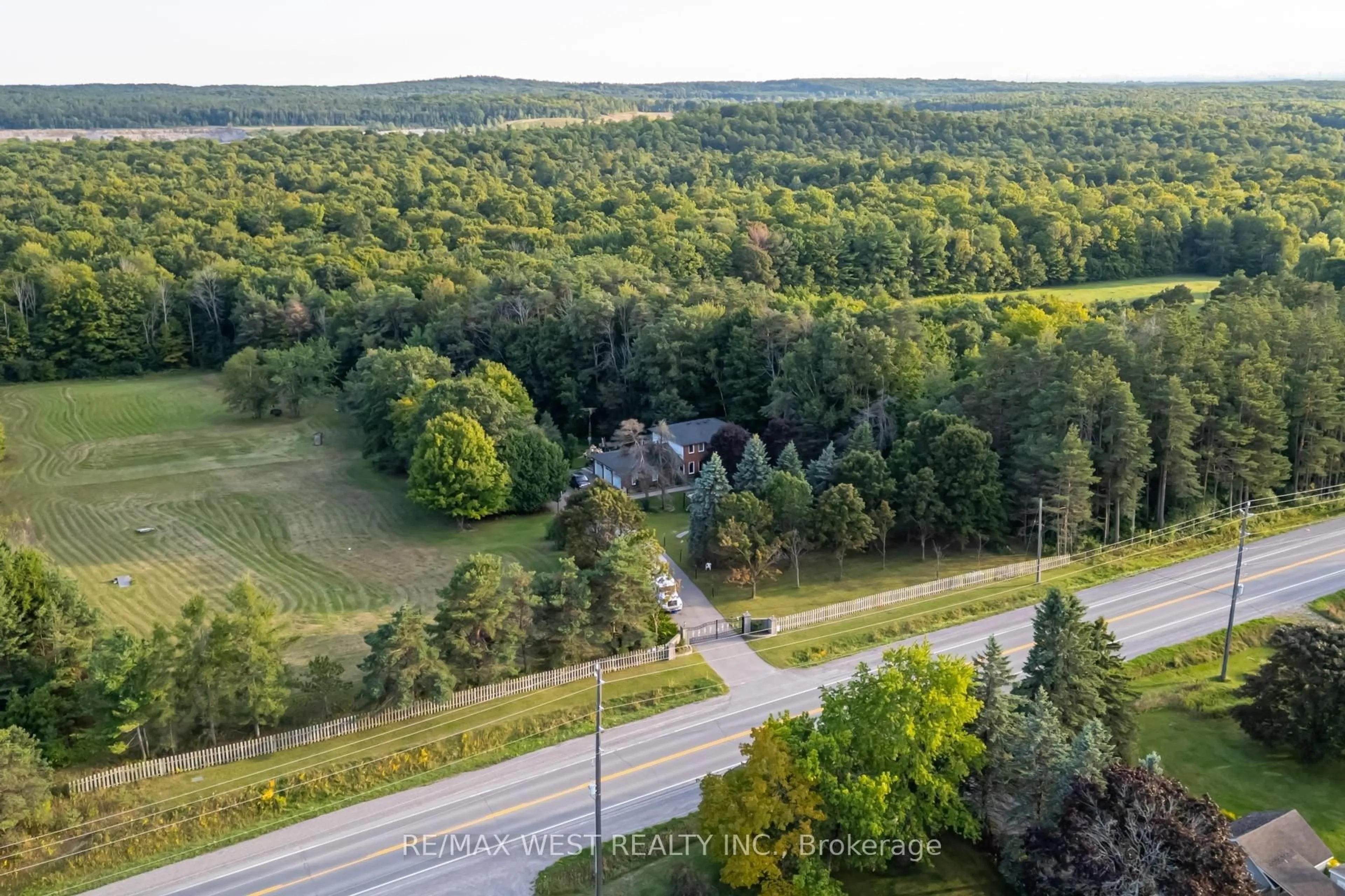 A pic from outside/outdoor area/front of a property/back of a property/a pic from drone, forest/trees view for 661 Regional Road 21, Uxbridge Ontario L9L 1B5