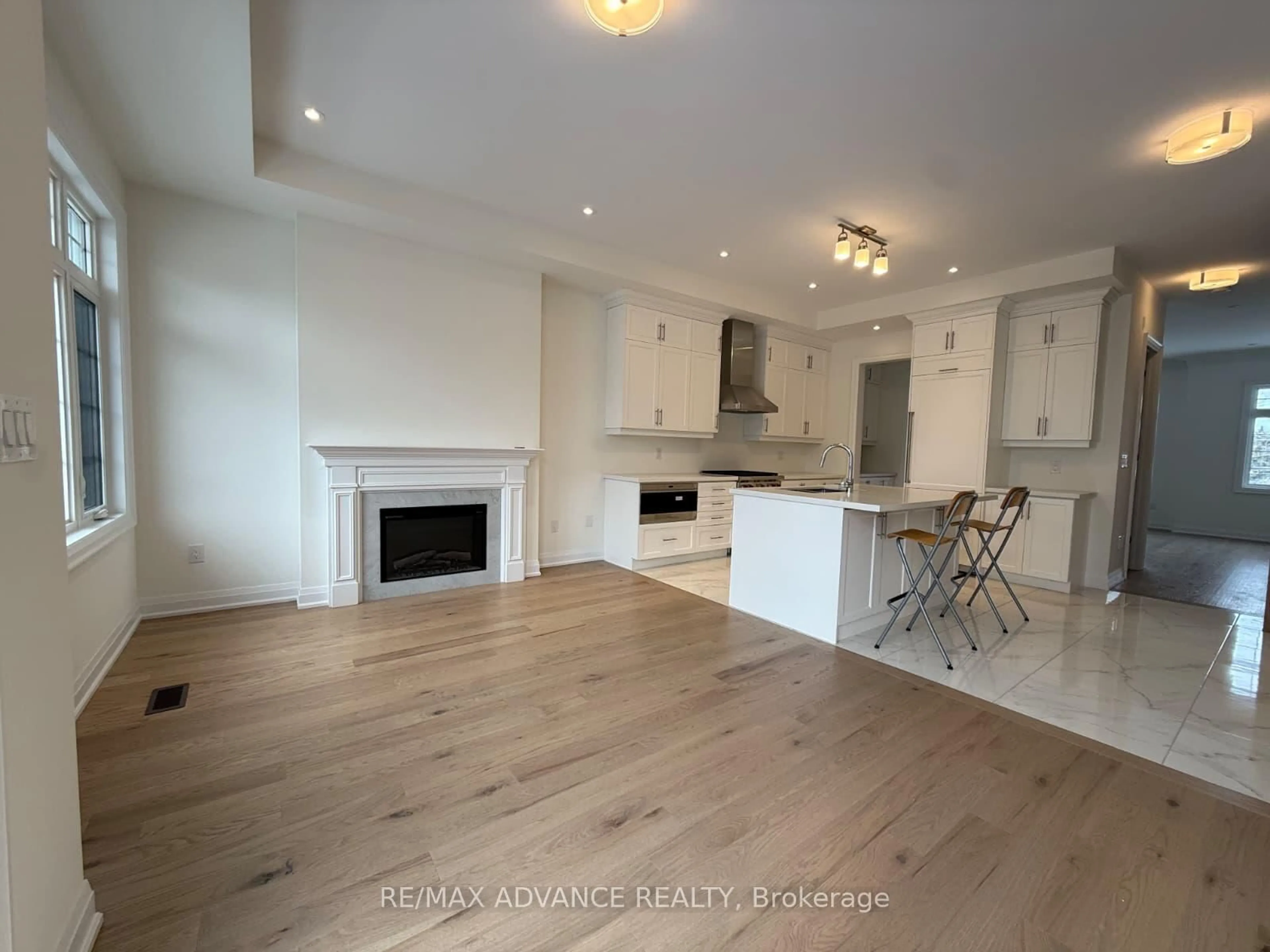 Open concept kitchen, wood/laminate floor for 4201 Major Mackenzie Dr Dr, Markham Ontario L6C 3L5