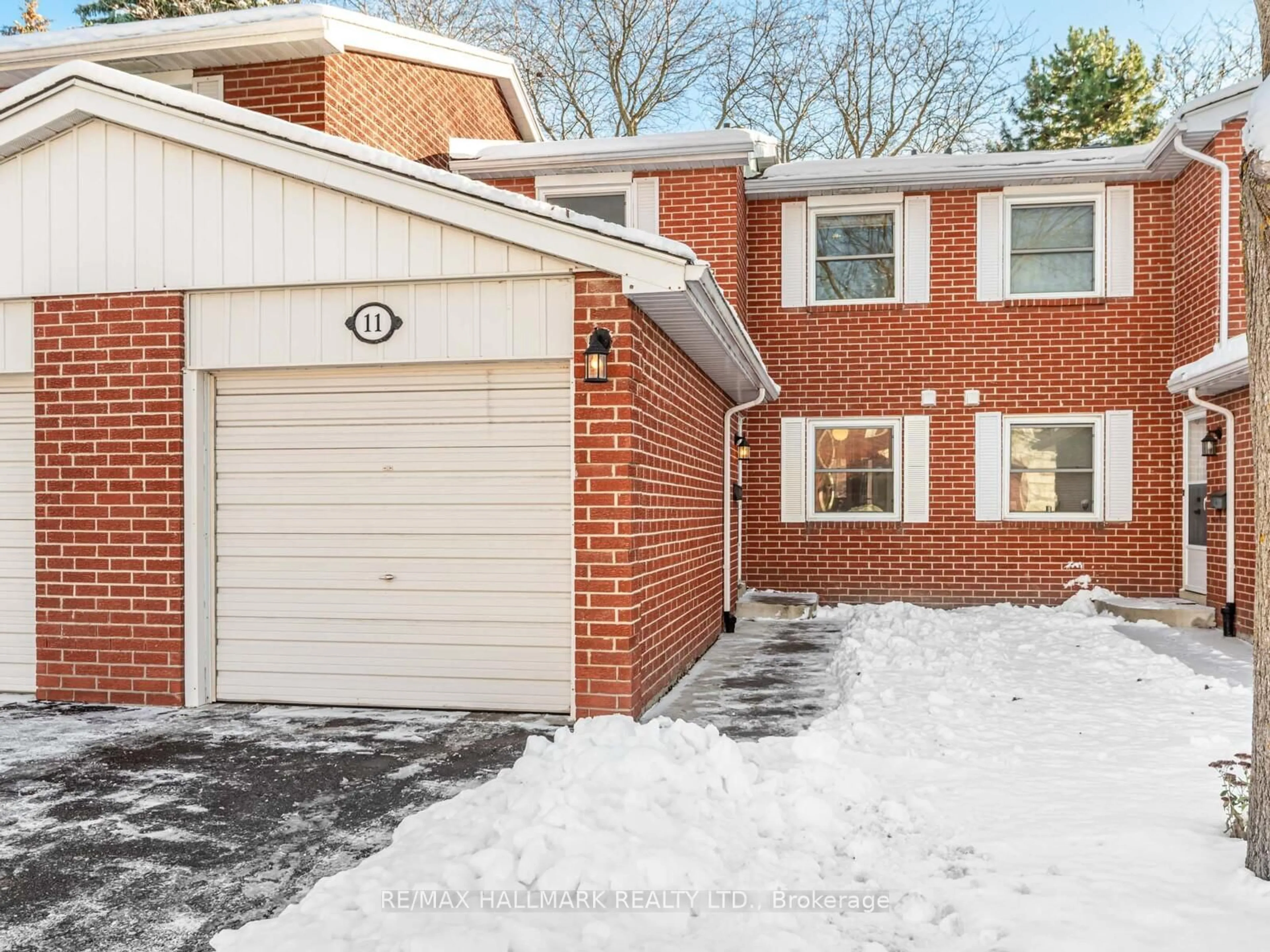 Home with brick exterior material, street for 11 Reith Way #405, Markham Ontario L3T 5C6