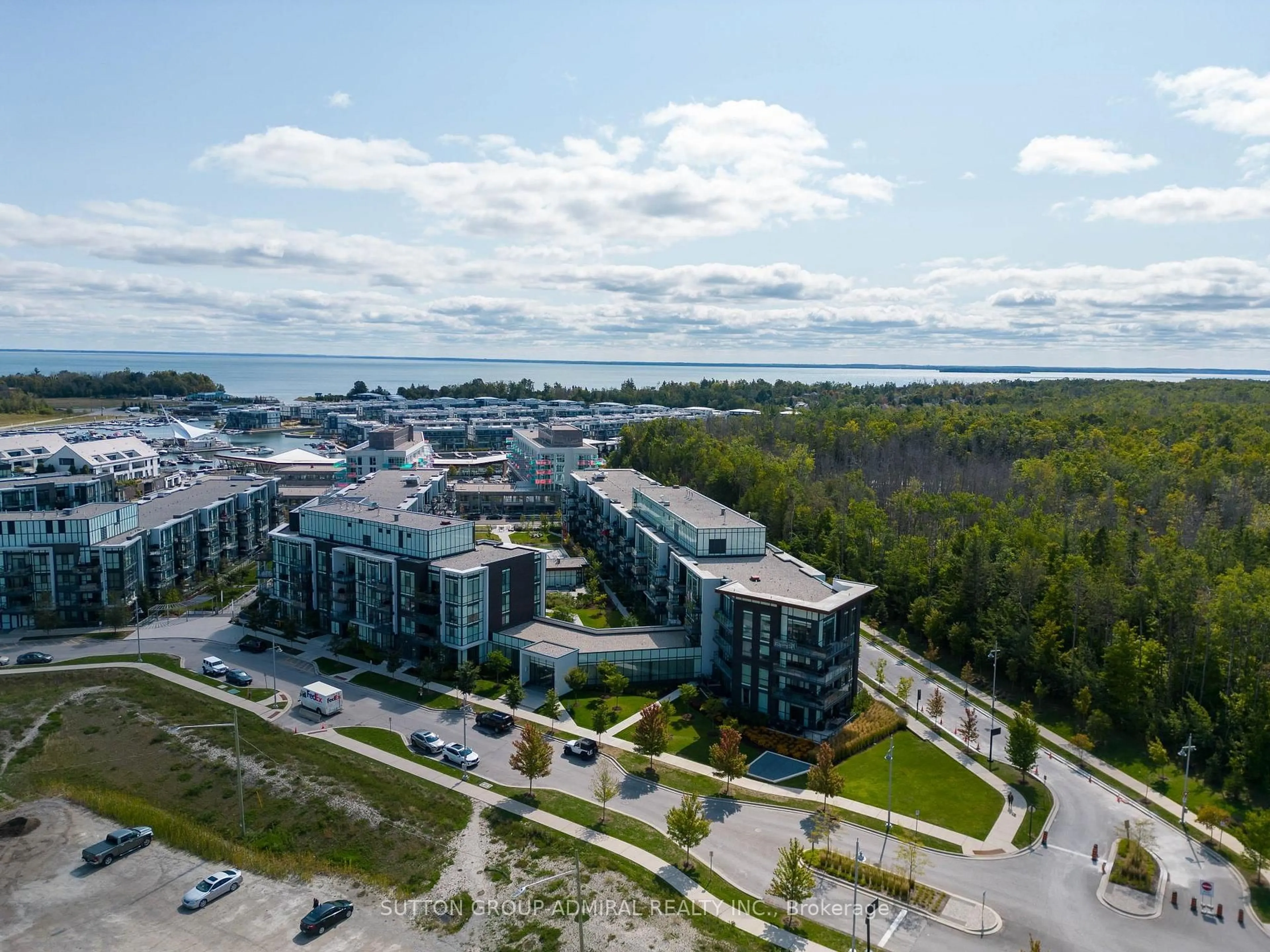 A pic from outside/outdoor area/front of a property/back of a property/a pic from drone, water/lake/river/ocean view for 415 Sea Ray Ave #431, Innisfil Ontario L9S 0R5