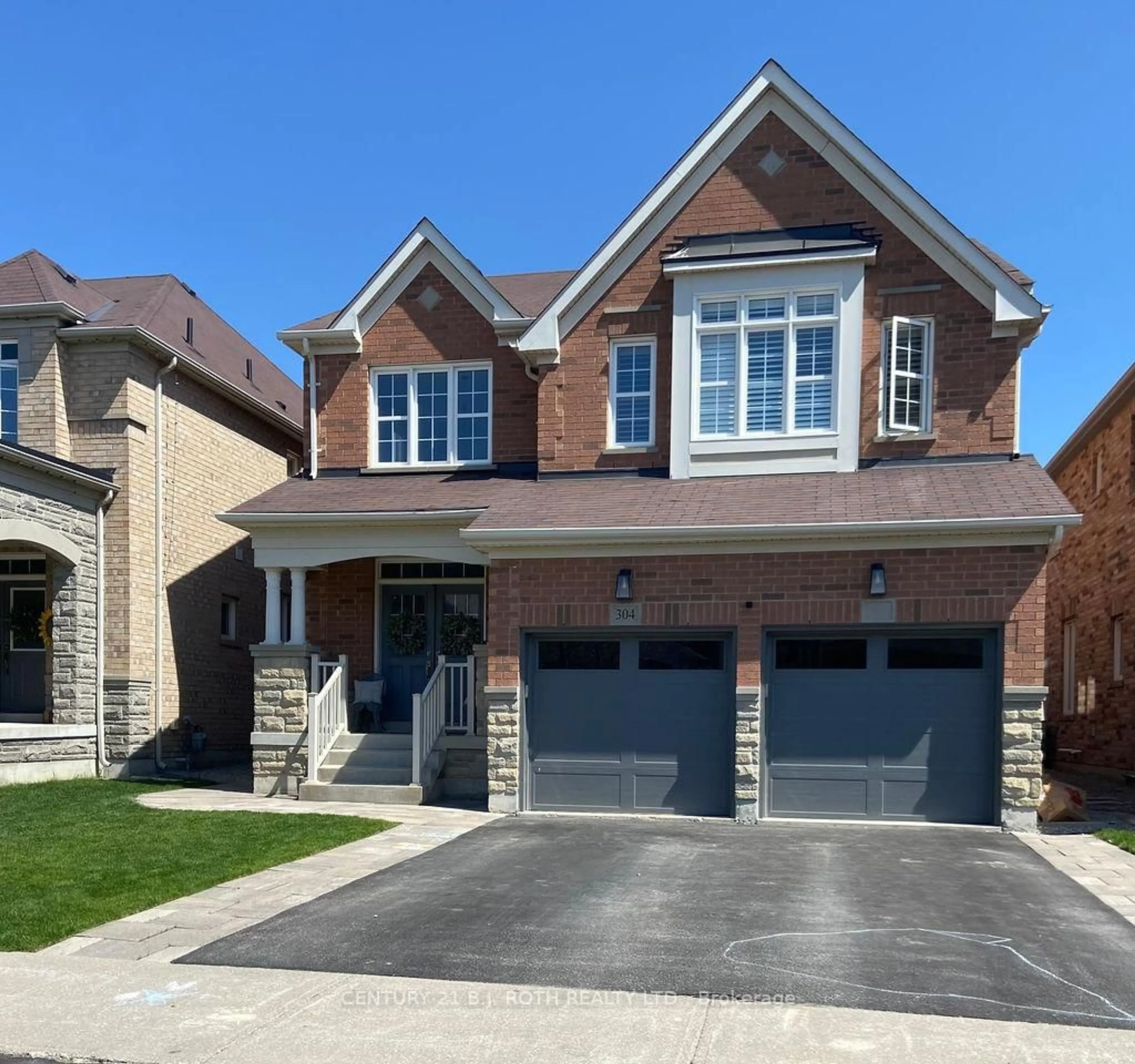 Home with brick exterior material, street for 304 Downy Emerald Dr, Bradford West Gwillimbury Ontario L3Z 0K3