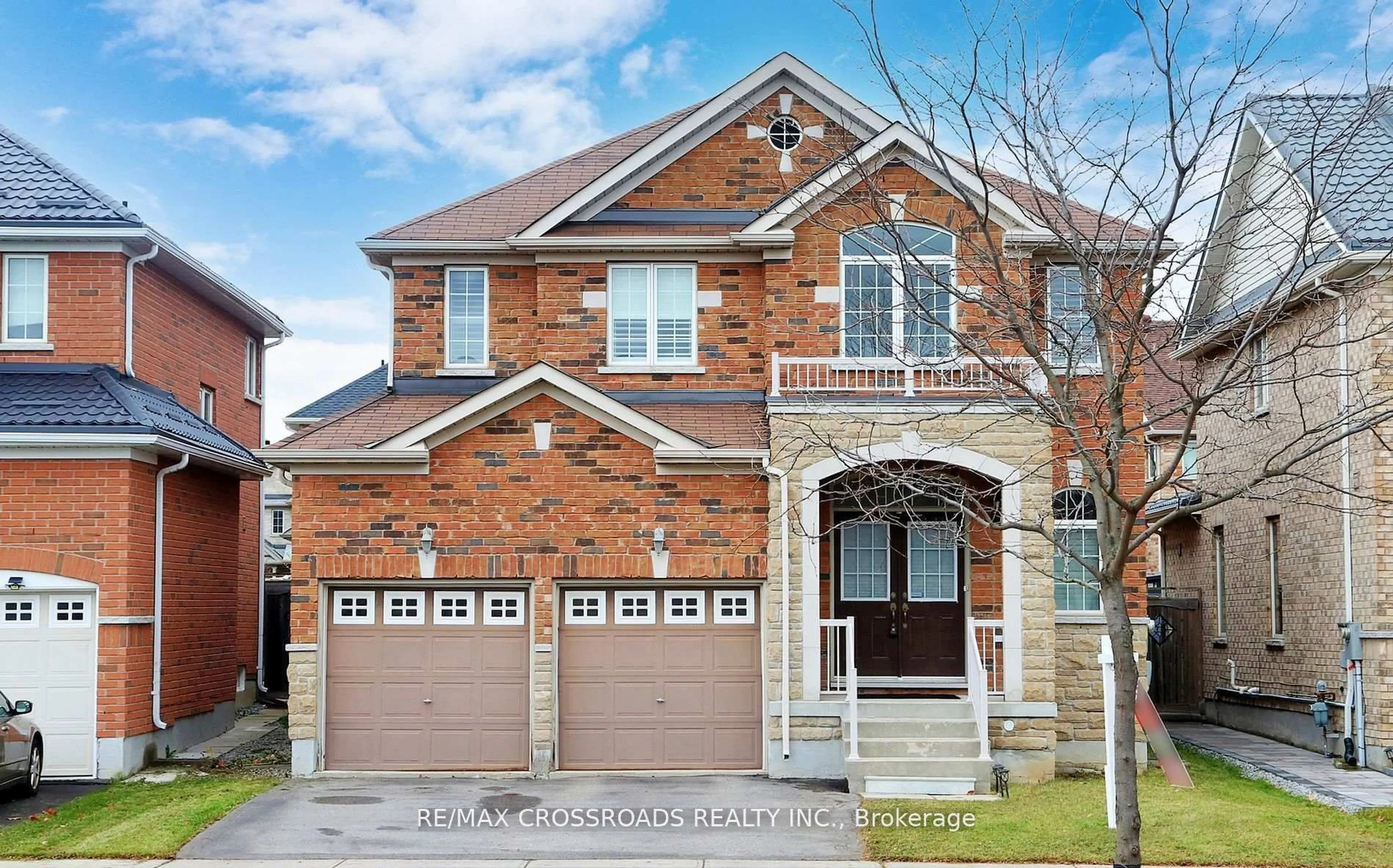 Home with brick exterior material, street for 73 Eakin Mill Rd, Markham Ontario L6E 1N9