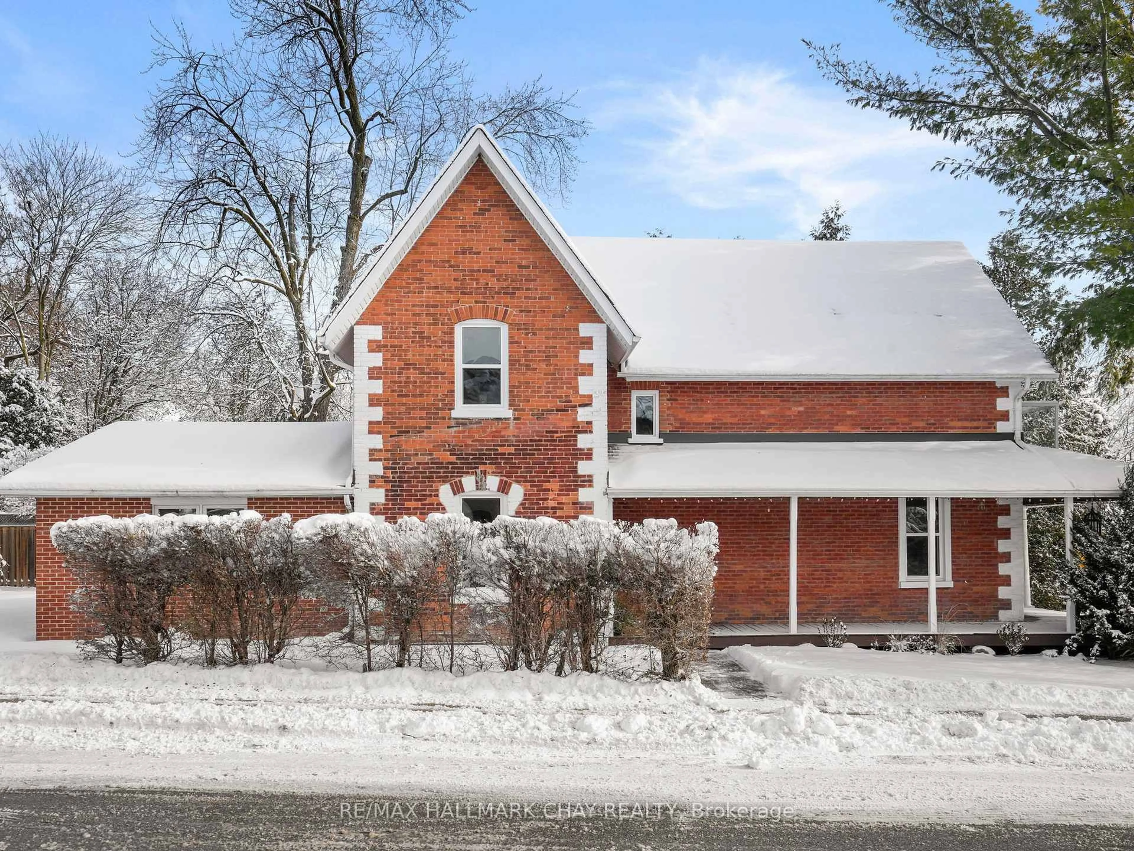 Home with brick exterior material, street for 14 Wilson St, New Tecumseth Ontario L0G 1W0