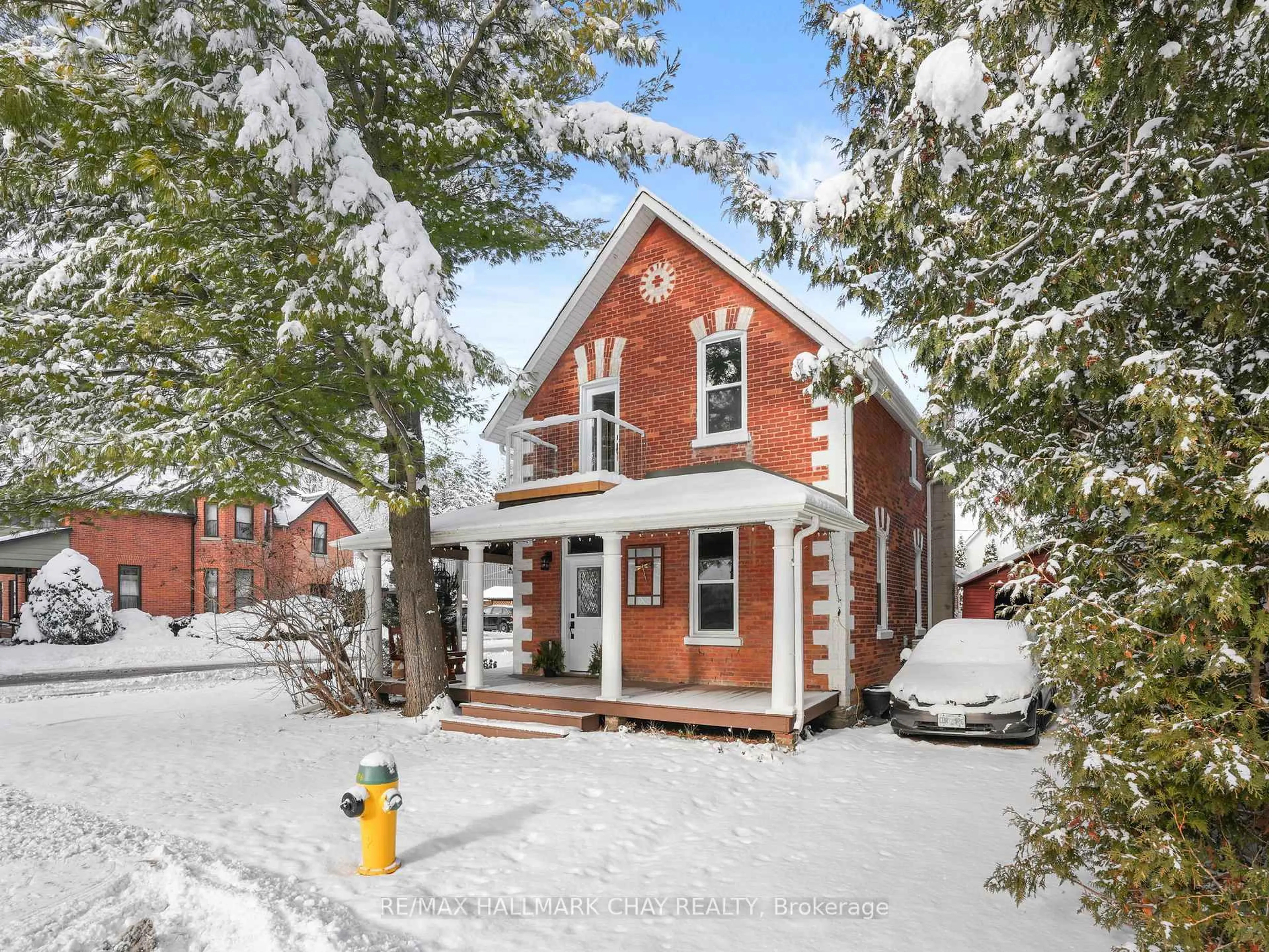 Home with brick exterior material, street for 14 Wilson St, New Tecumseth Ontario L0G 1W0