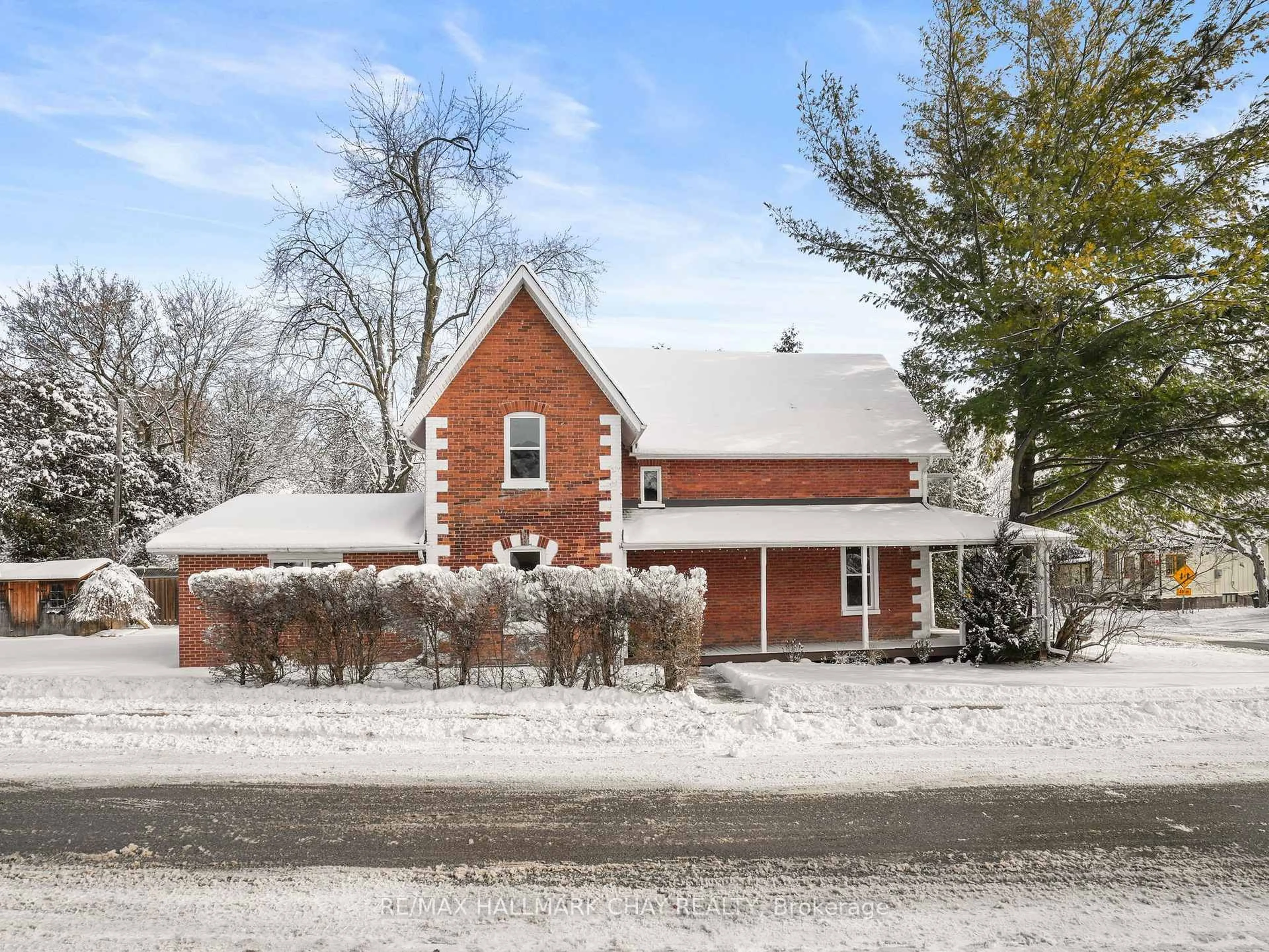 Home with brick exterior material, street for 14 Wilson St, New Tecumseth Ontario L0G 1W0