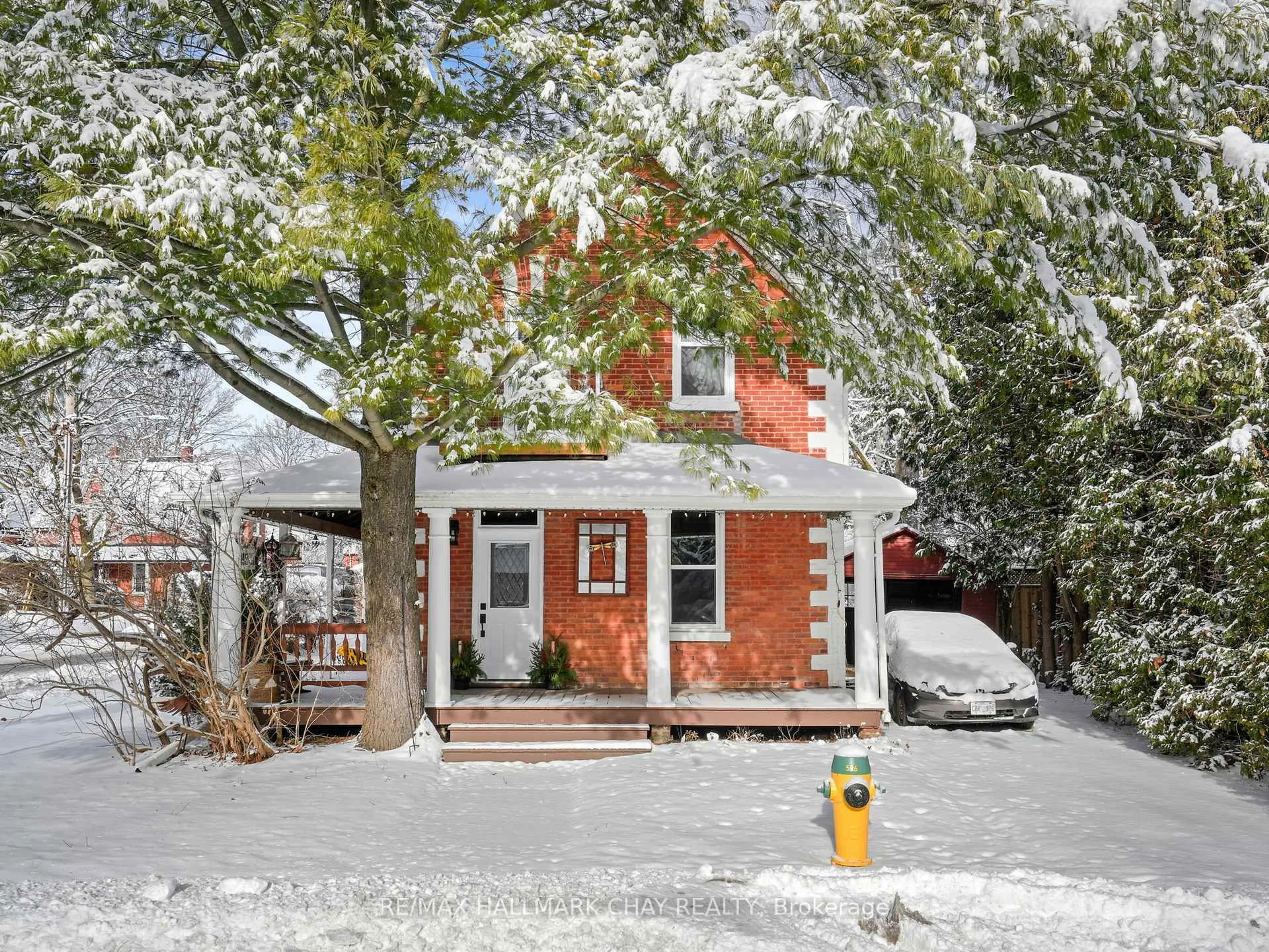 Home with brick exterior material, street for 14 Wilson St, New Tecumseth Ontario L0G 1W0