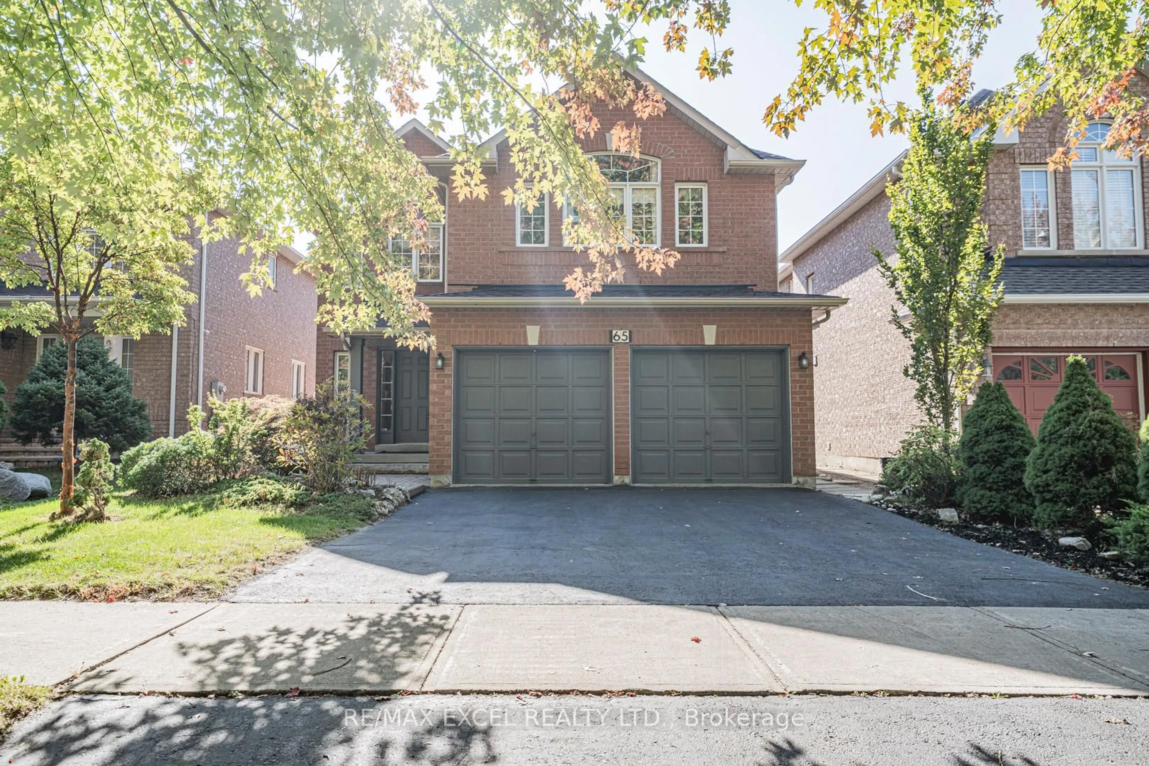 Home with brick exterior material, street for 65 Falling River Dr, Richmond Hill Ontario L4S 2R3