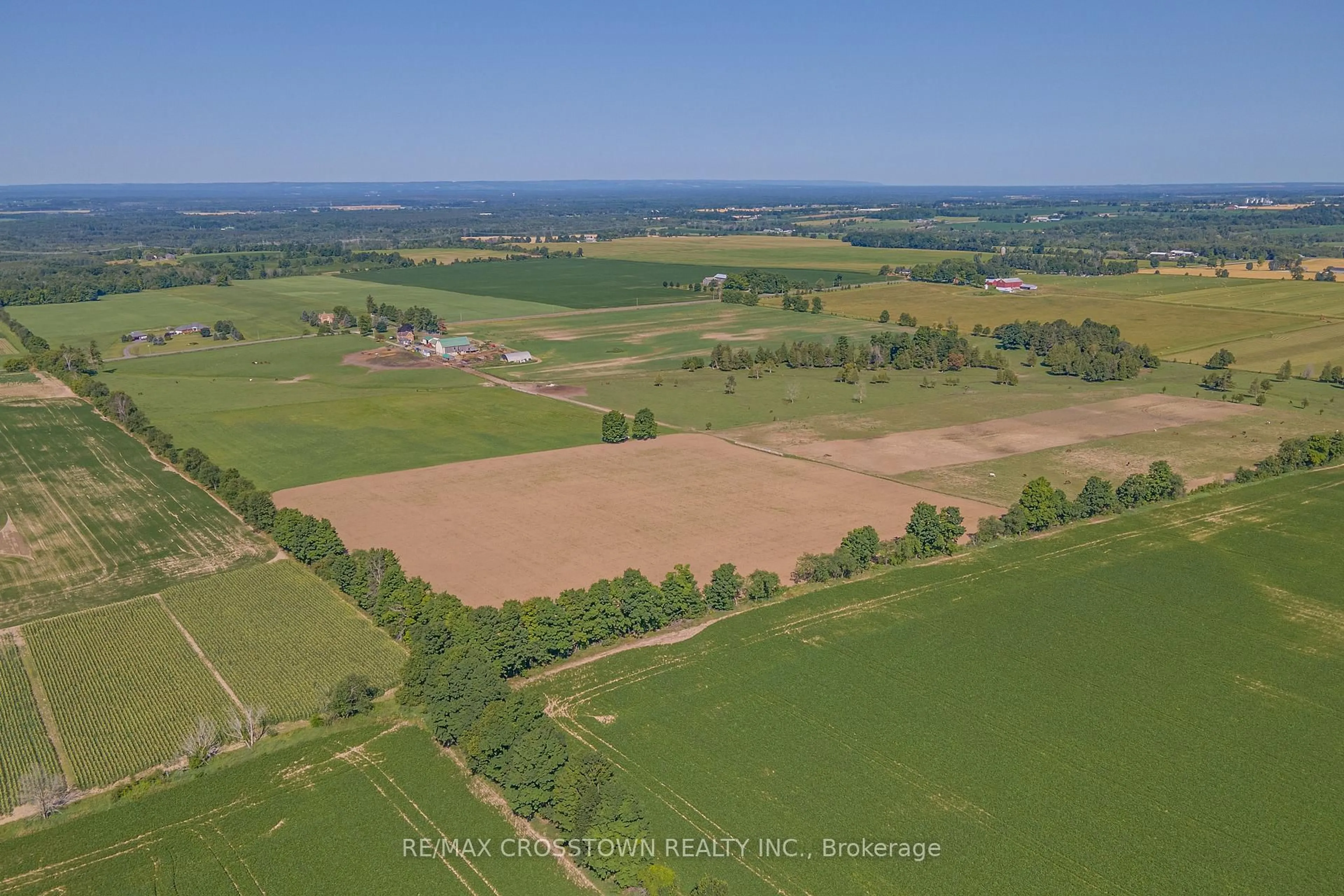 A pic from outside/outdoor area/front of a property/back of a property/a pic from drone, water/lake/river/ocean view for 6409 10th Line, Essa Ontario L0L 2N0