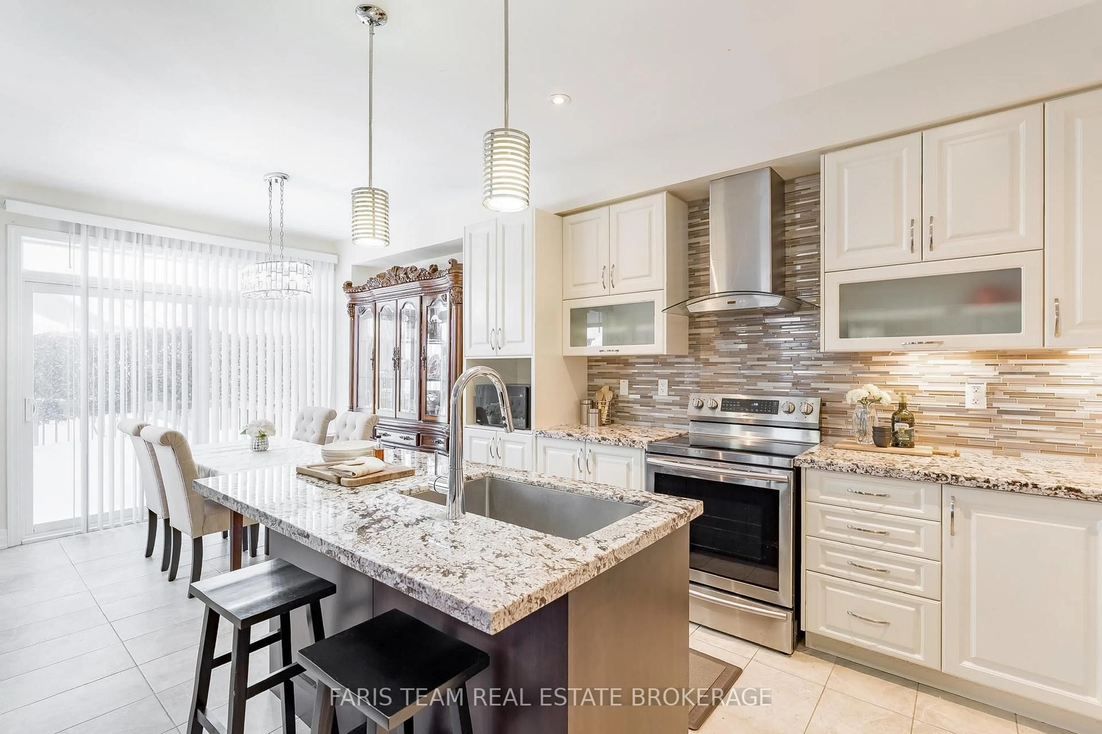 Open concept kitchen, ceramic/tile floor for 12 Hutton Cres, Essa Ontario L3W 0R6