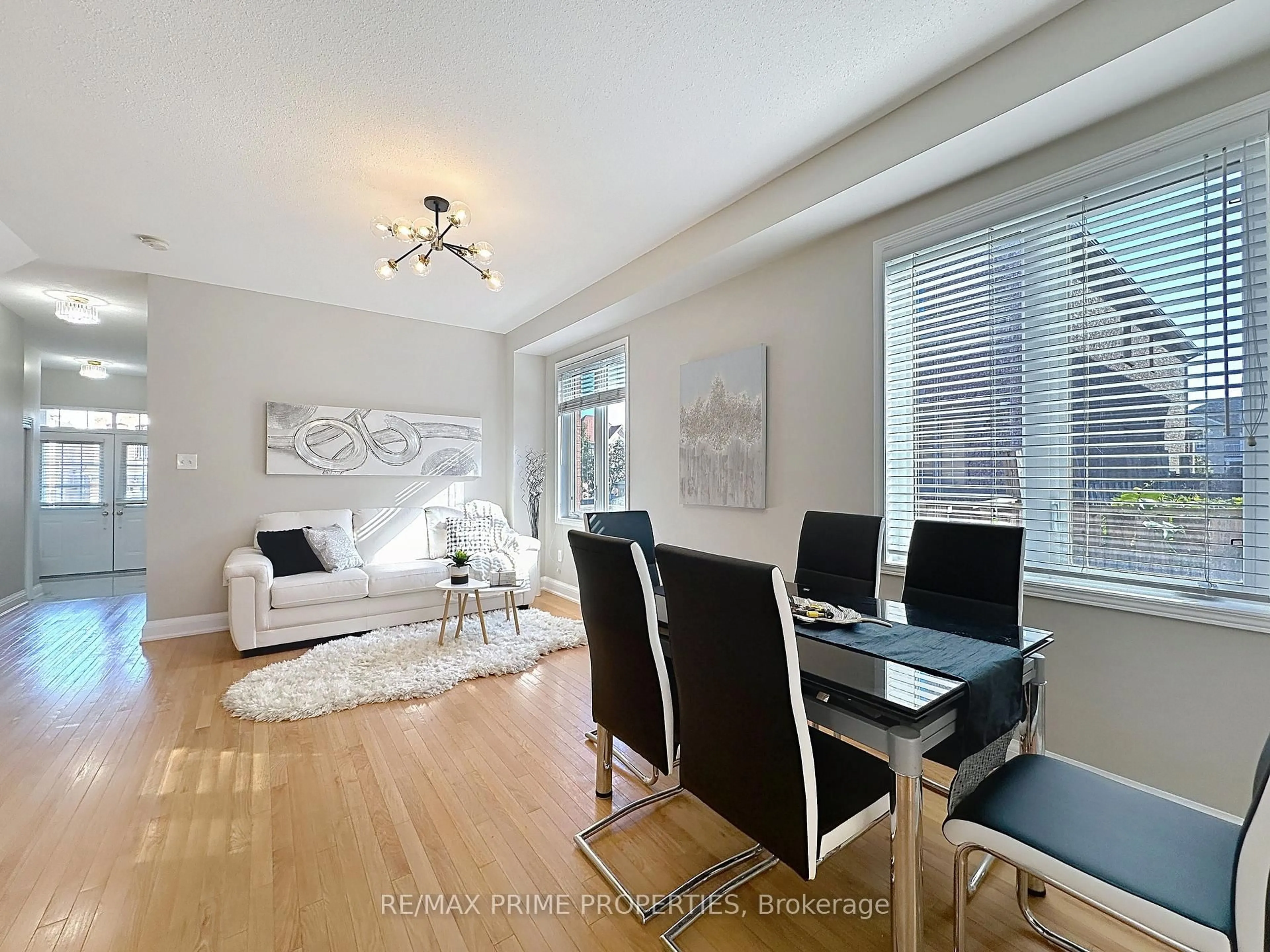 Living room with furniture, wood/laminate floor for 117 Big Hill Cres, Vaughan Ontario L6A 4K7