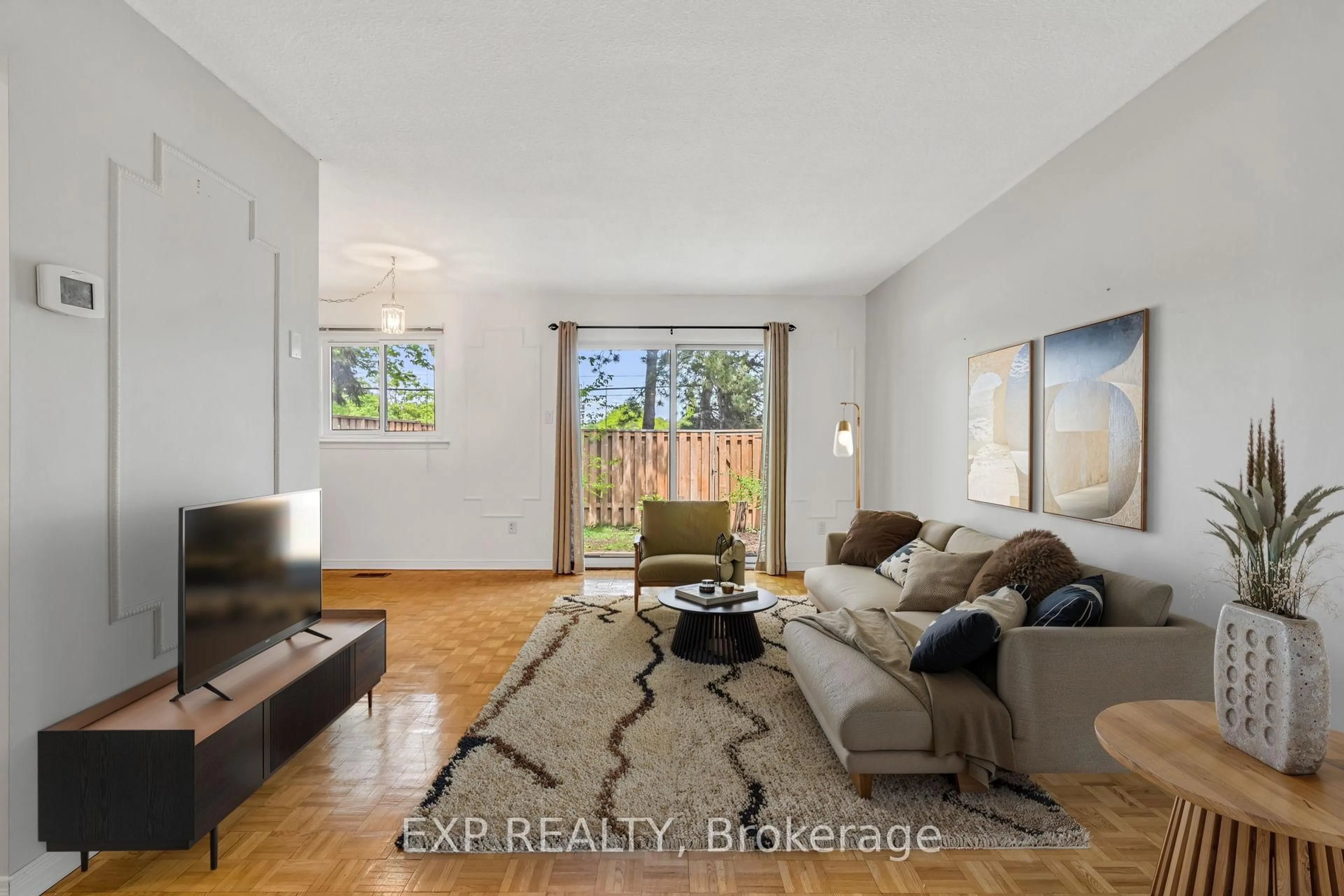 Living room with furniture, unknown for 22 Niles Way #325, Markham Ontario L3T 5B8