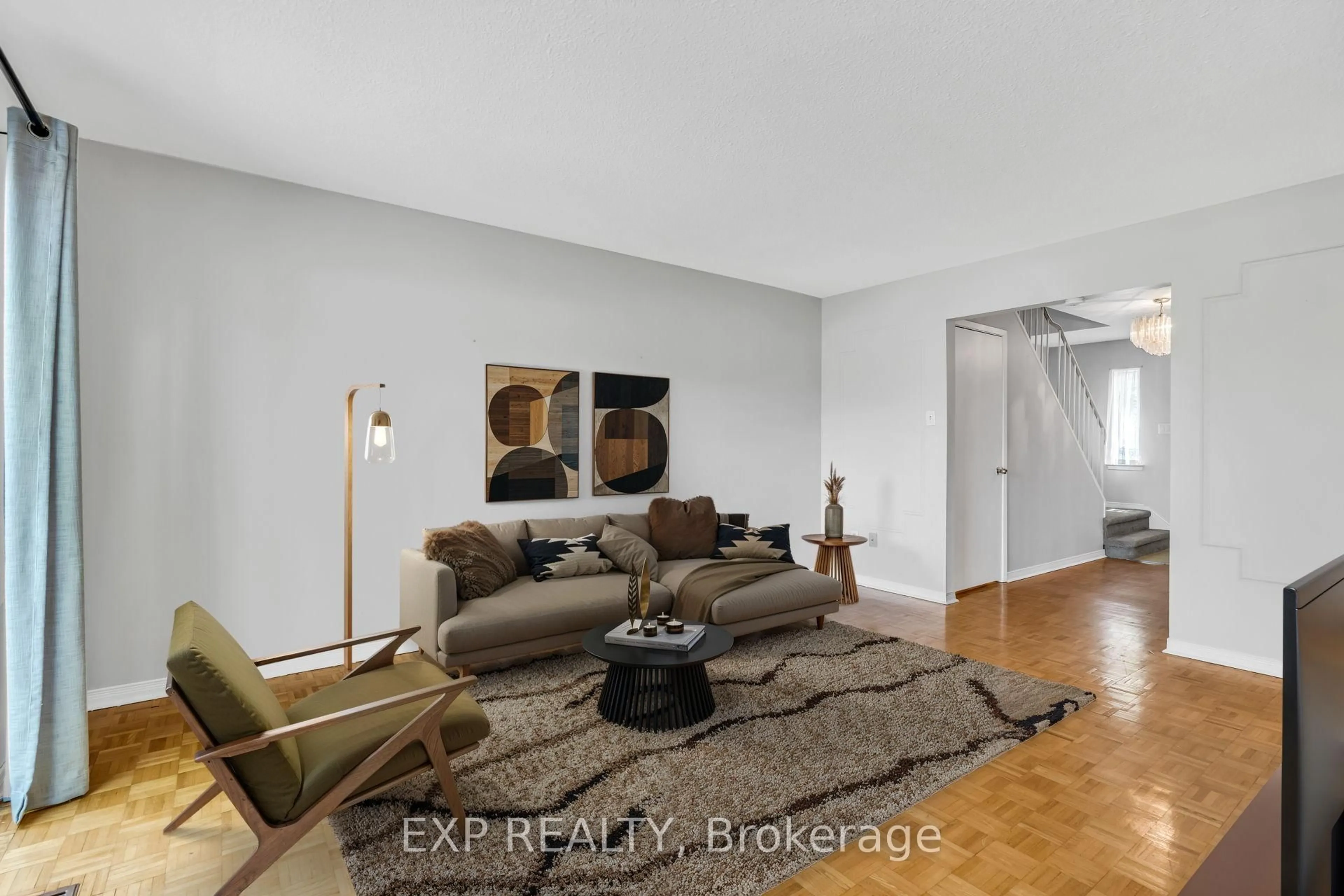 Living room with furniture, unknown for 22 Niles Way #325, Markham Ontario L3T 5B8